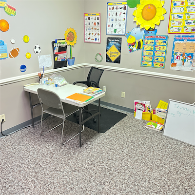 Empty tutoring station decorated with educational materials
