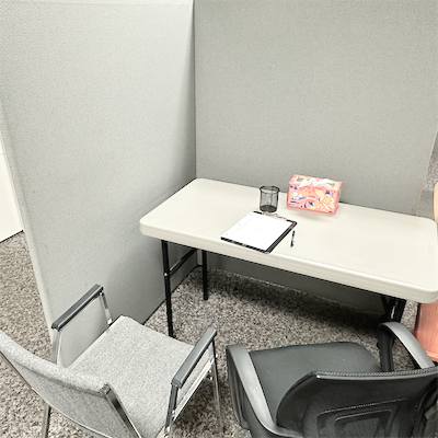 Tutoring station with two empty chairs