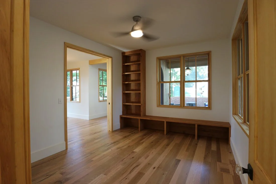 Custom playroom interior with radiata pine trim and built-in alder shelving