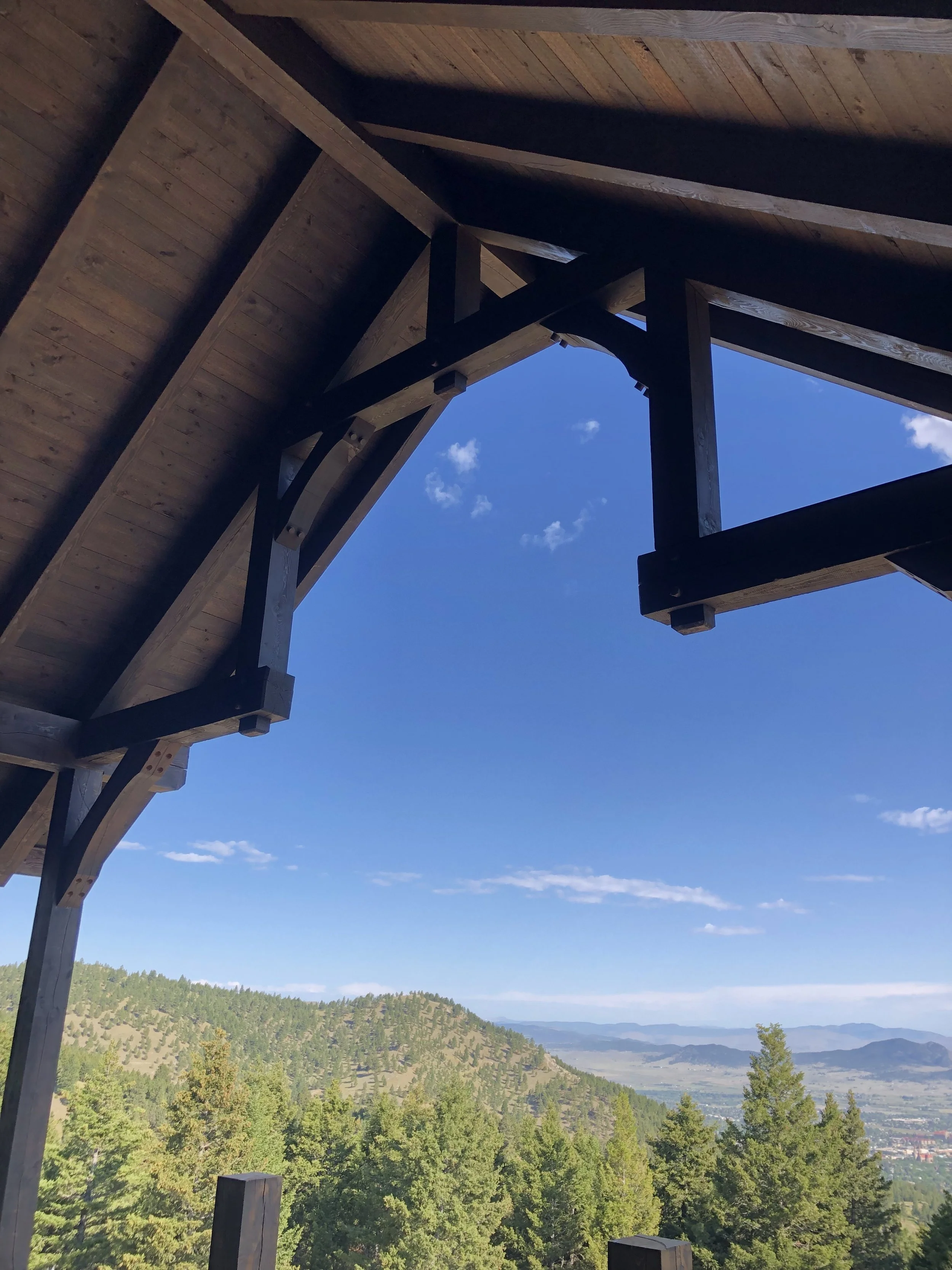 Timber frame overhang framing mountain landscape view