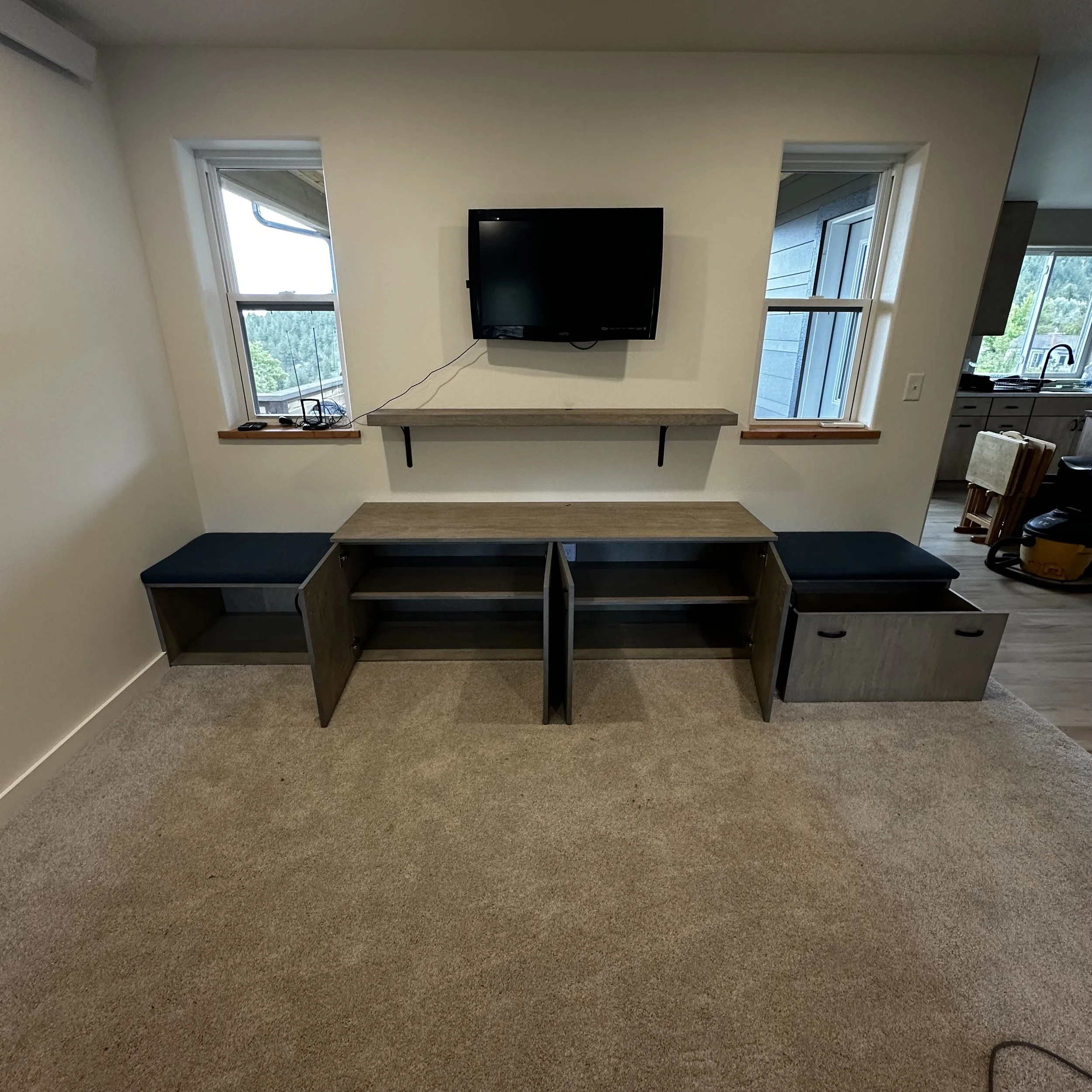 Built-in entertainment and storage system in stained maple