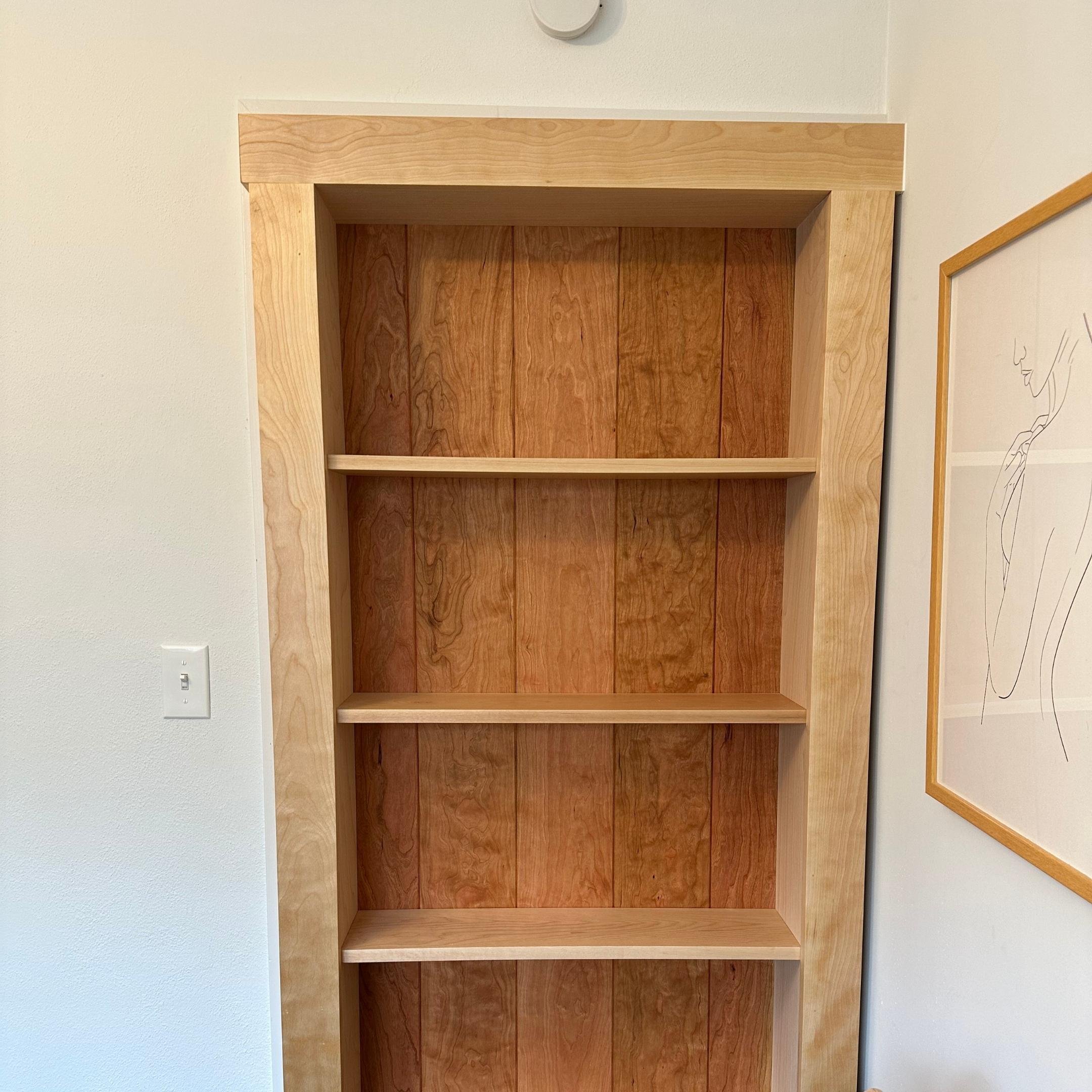 Custom cherry cabinet with birch frame and open shelving