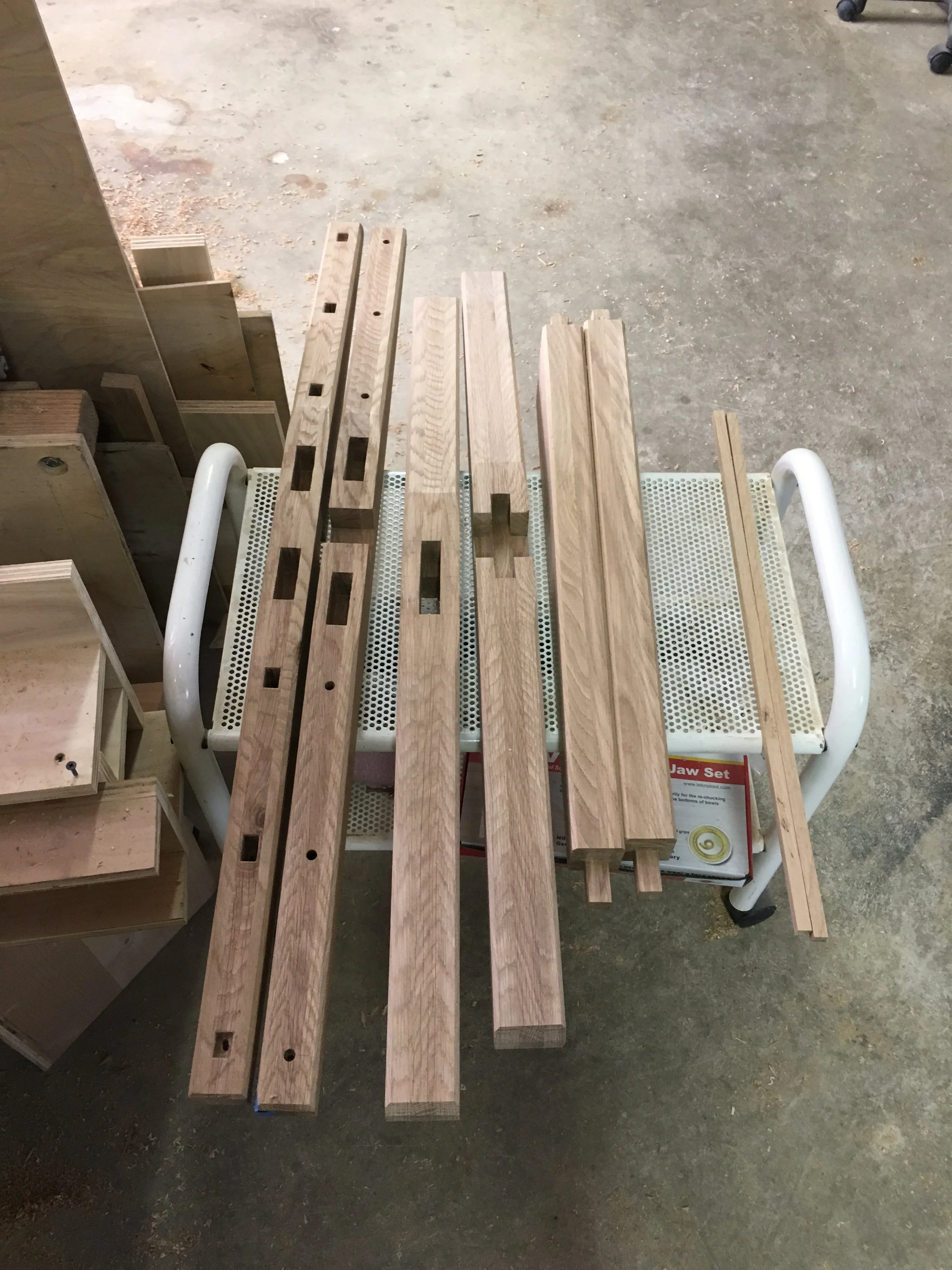 Wood components prepared for joinery with mortise and tenon cuts