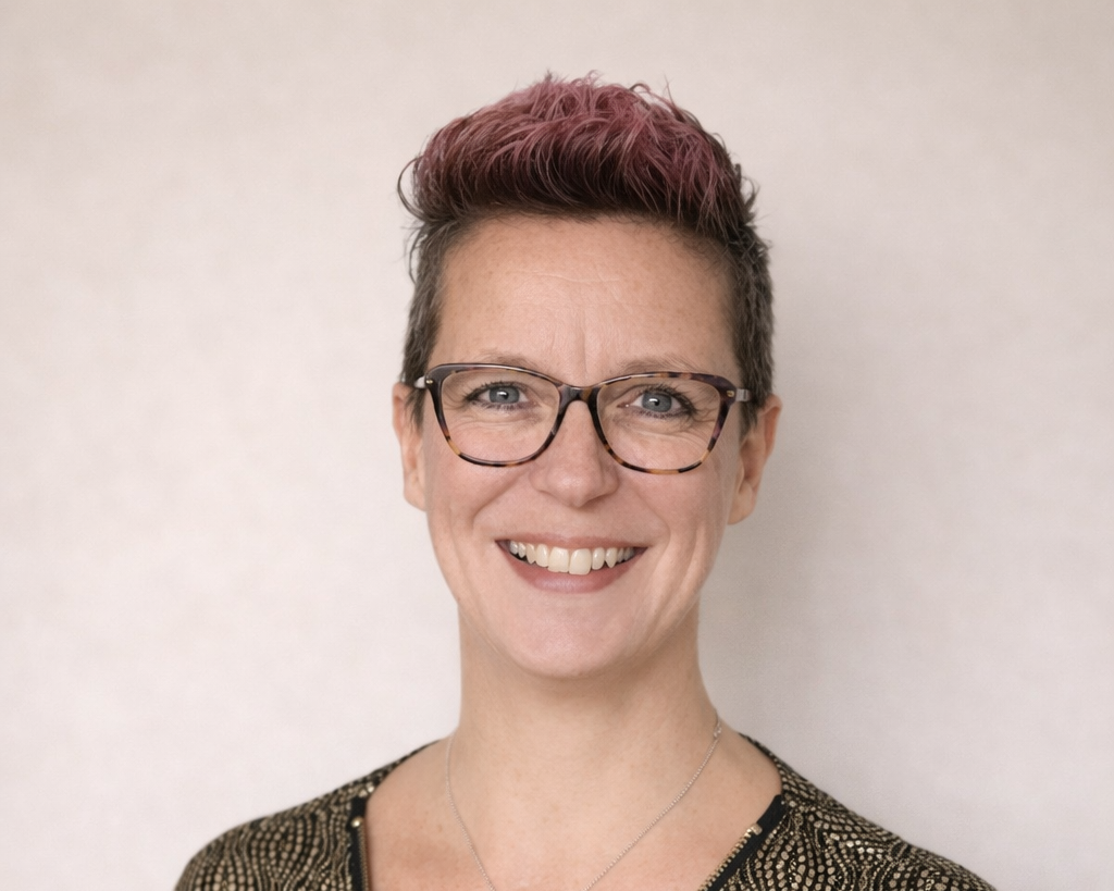 smiling female chiropractor and acupuncturist