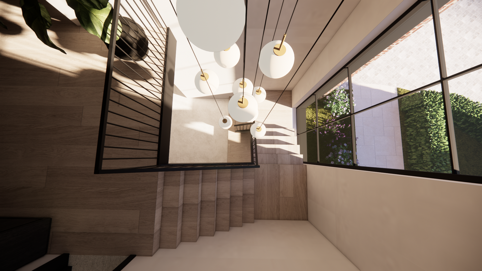 A top-down view of a staircase with wooden steps and black metal railing, overlooking a bright hallway illuminated by large windows with a garden outside. Modern hanging white pendant lights hang from the ceiling.