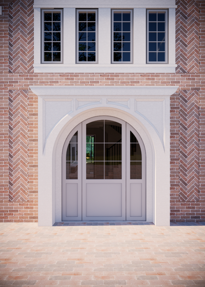 Brick building with large arched doorway and multiple-pane windows above.