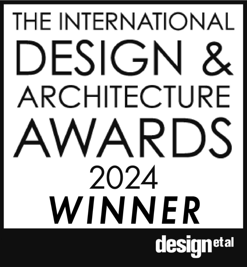 Black and white graphic announcing the 2024 International Design & Architecture Awards winner, with a black border at the bottom displaying the logo 'design et al'.