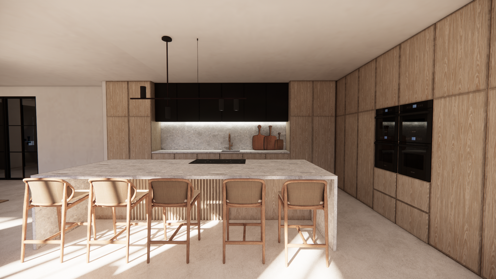 Modern kitchen with wooden cabinetry, a large island with a granite countertop, and three wicker chairs. The kitchen features black upper cabinets, a marble backsplash, and built-in black appliances on the right wall.