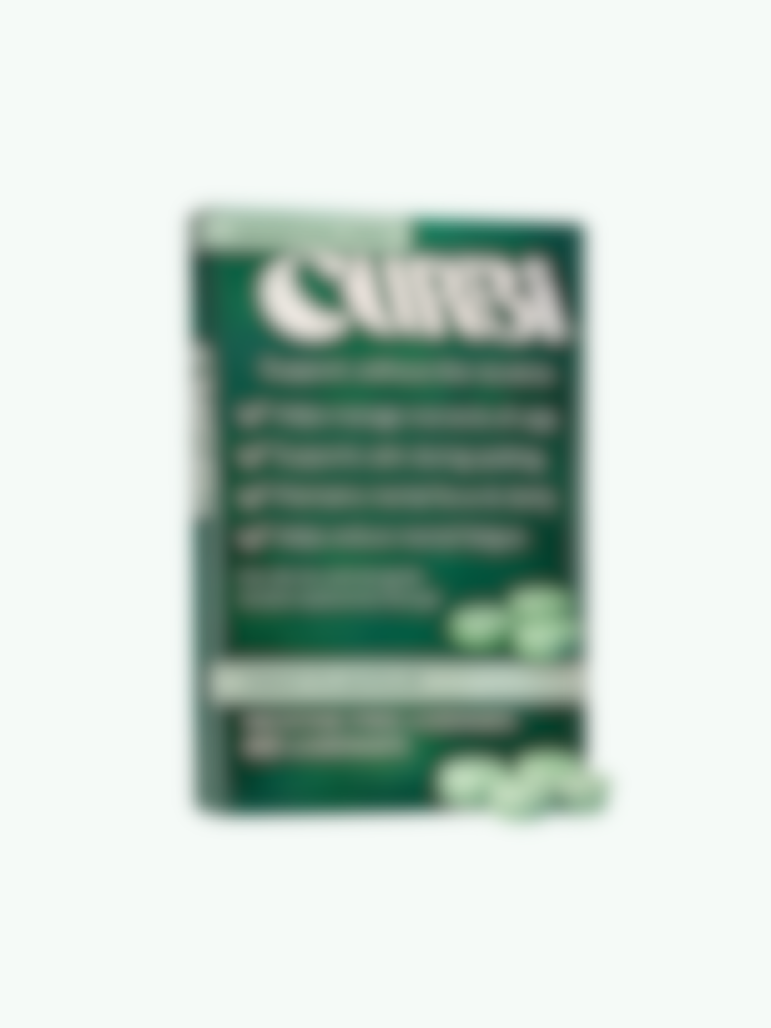 A green and white Clif Bar packaging with nutritional information and branding, slightly blurred.