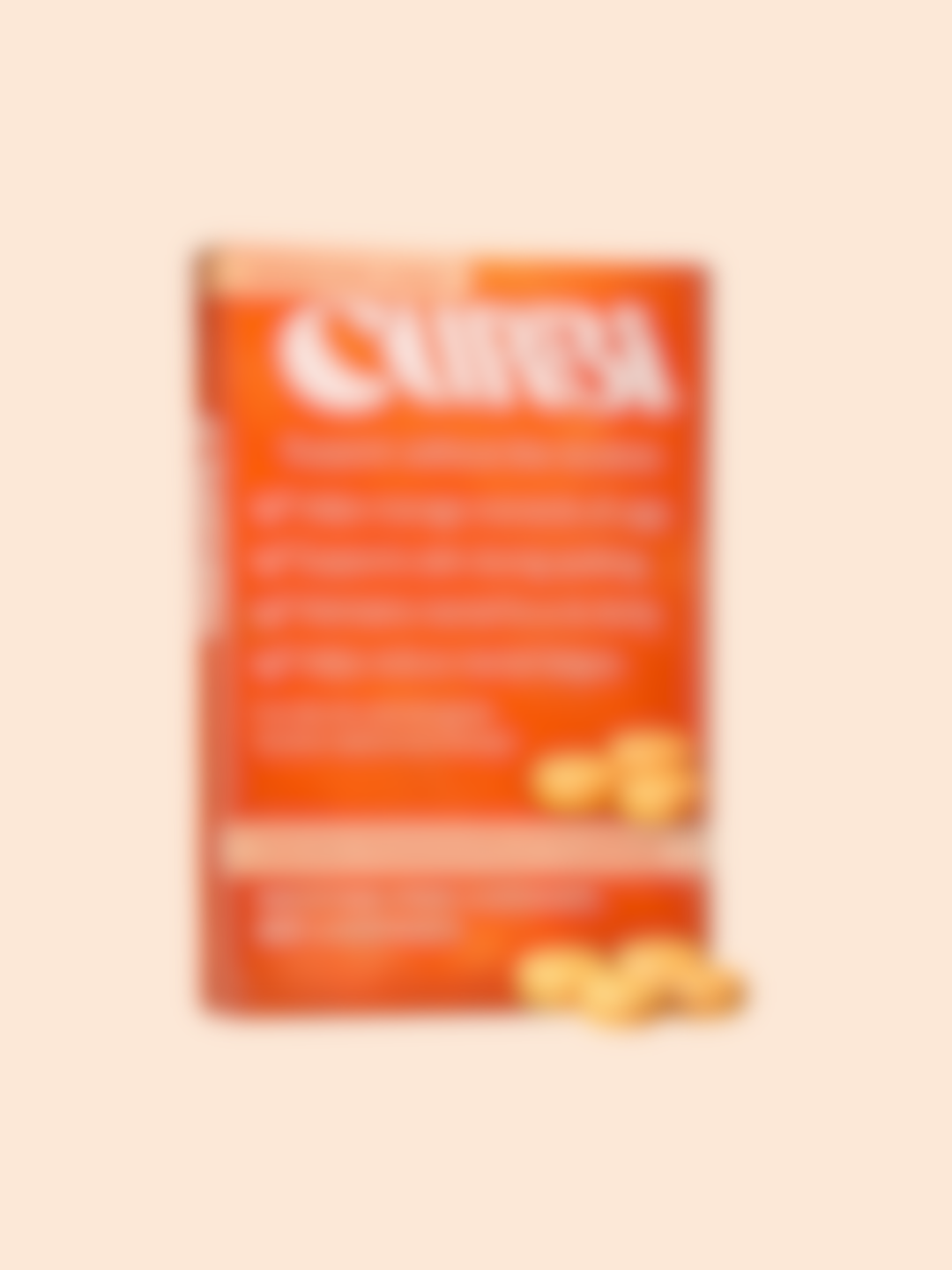 Blurred image of an orange box of Citra tablets with some tablets in front of it.