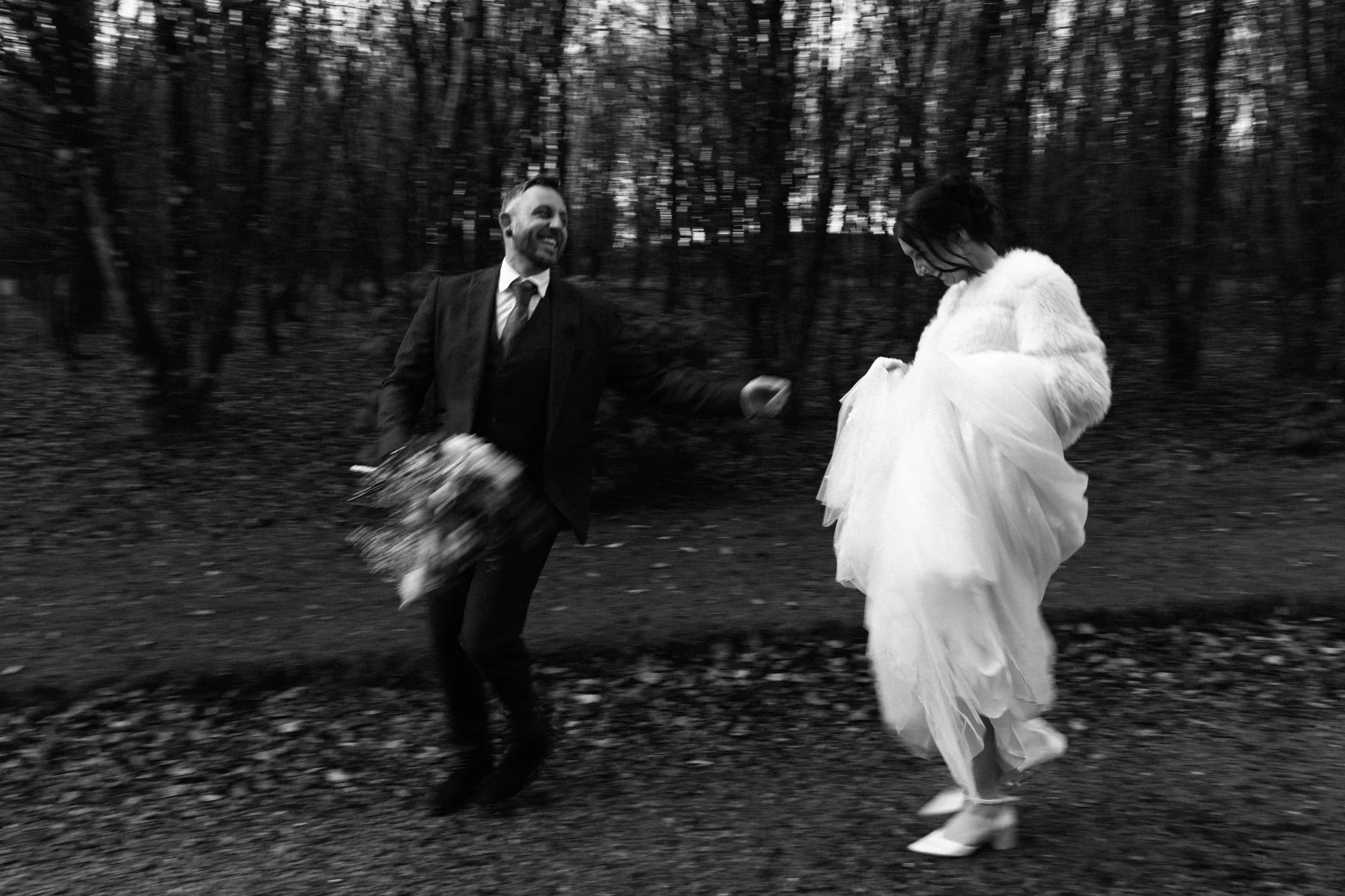 A black-and-white photo Editorial wedding photography capturing natural moments in the UK