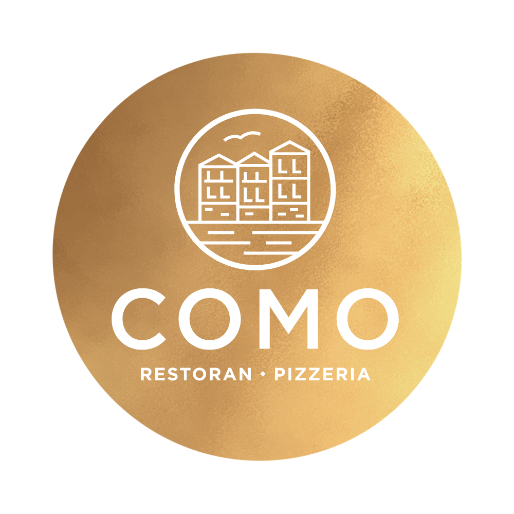 Gold circular logo for COMO restaurant and pizzeria, featuring a line drawing of three buildings with water and birds in the background.