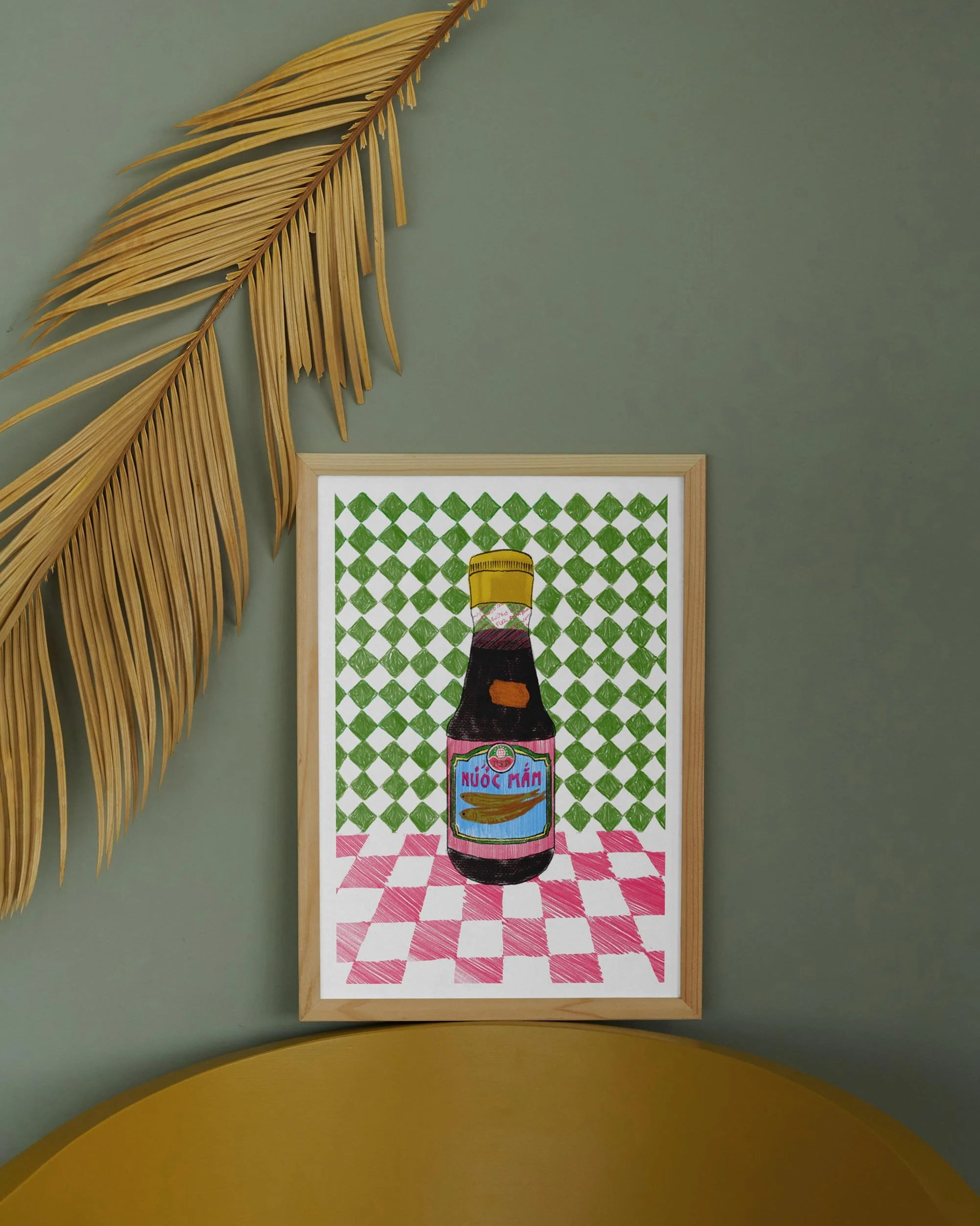 Reproduction d'une illustration de Lucie Leforestier dans un cadre représentant un flacon de sauce nunc man