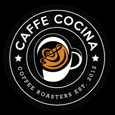 Logo for Caffe Coccina featuring a coffee cup with a heart and spoon, surrounded by text and stars.