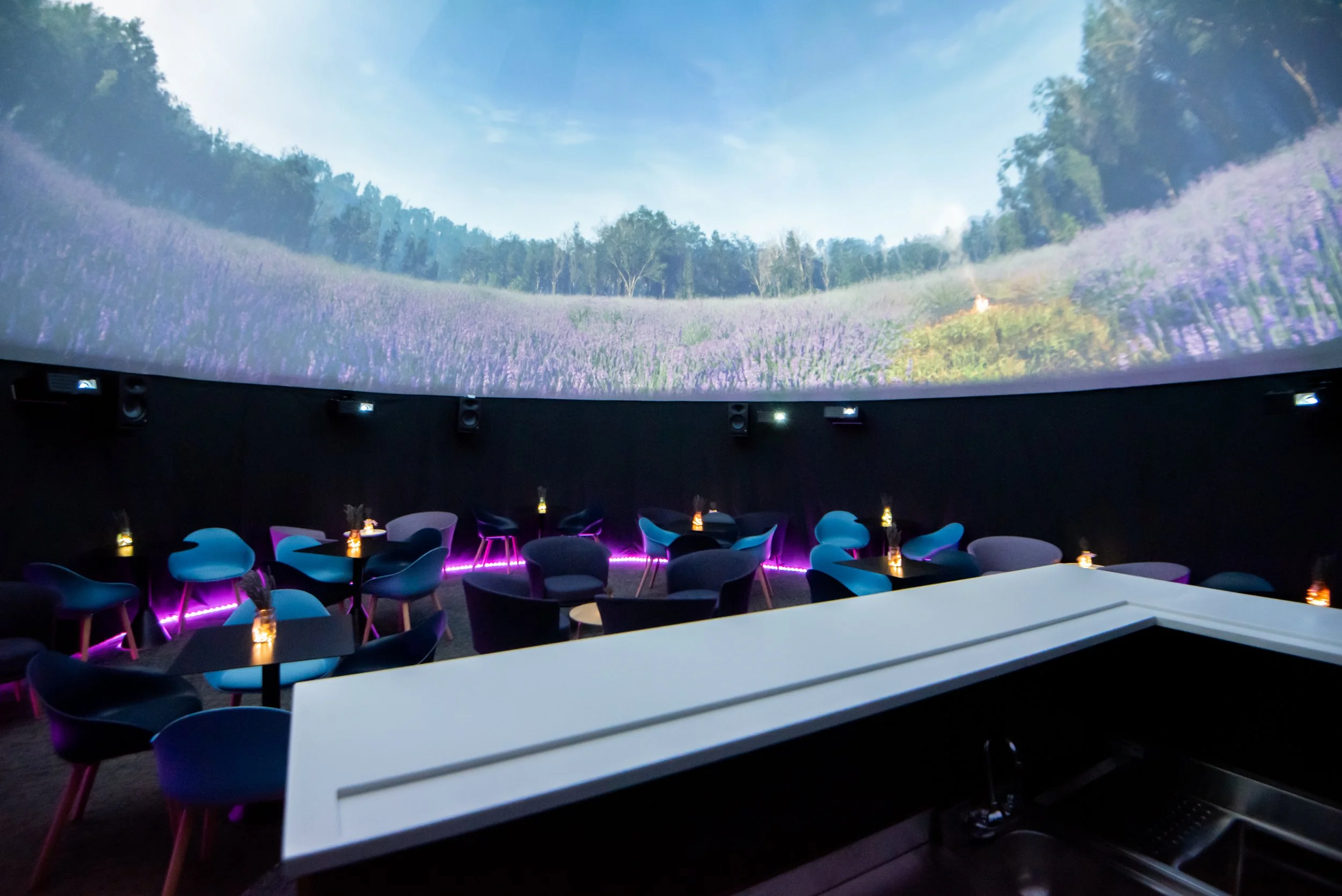 Tables and chairs in a 360-degree video dome