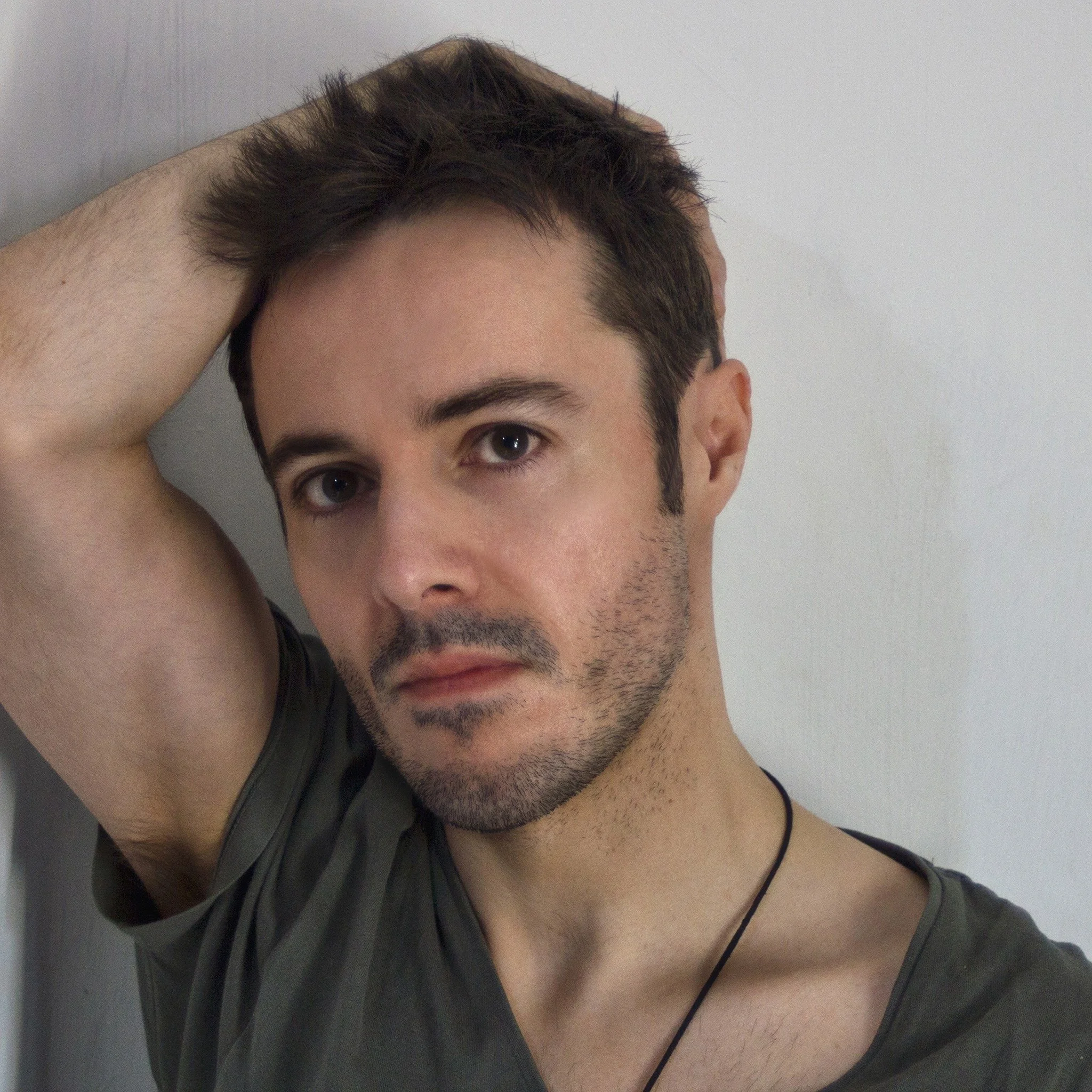 James Kennedy, the singer and frontman of the rock band 'Kyshera' posing with short hair