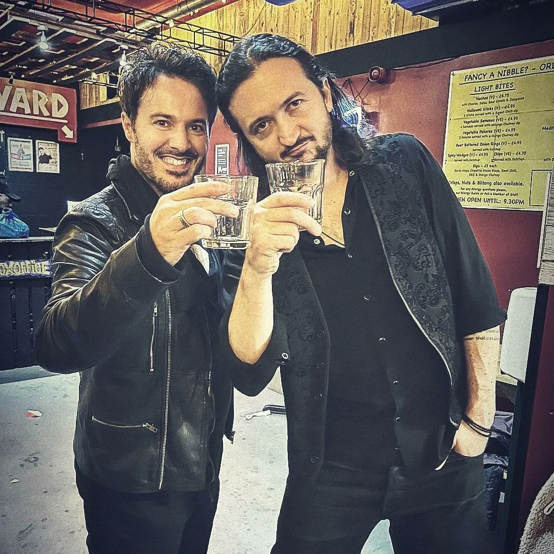 James Kennedy, the singer, author and podcaster from Wales drinking whiskey with American comedian, Lee Camp