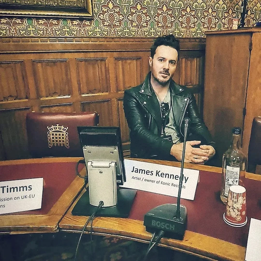 James Kennedy the singer, author and podcaster from Wales sitting in the House Of Lords in London after giving a speech with the Carry on Touring Campaign about how Brexit is affecting touring for UK music artists 