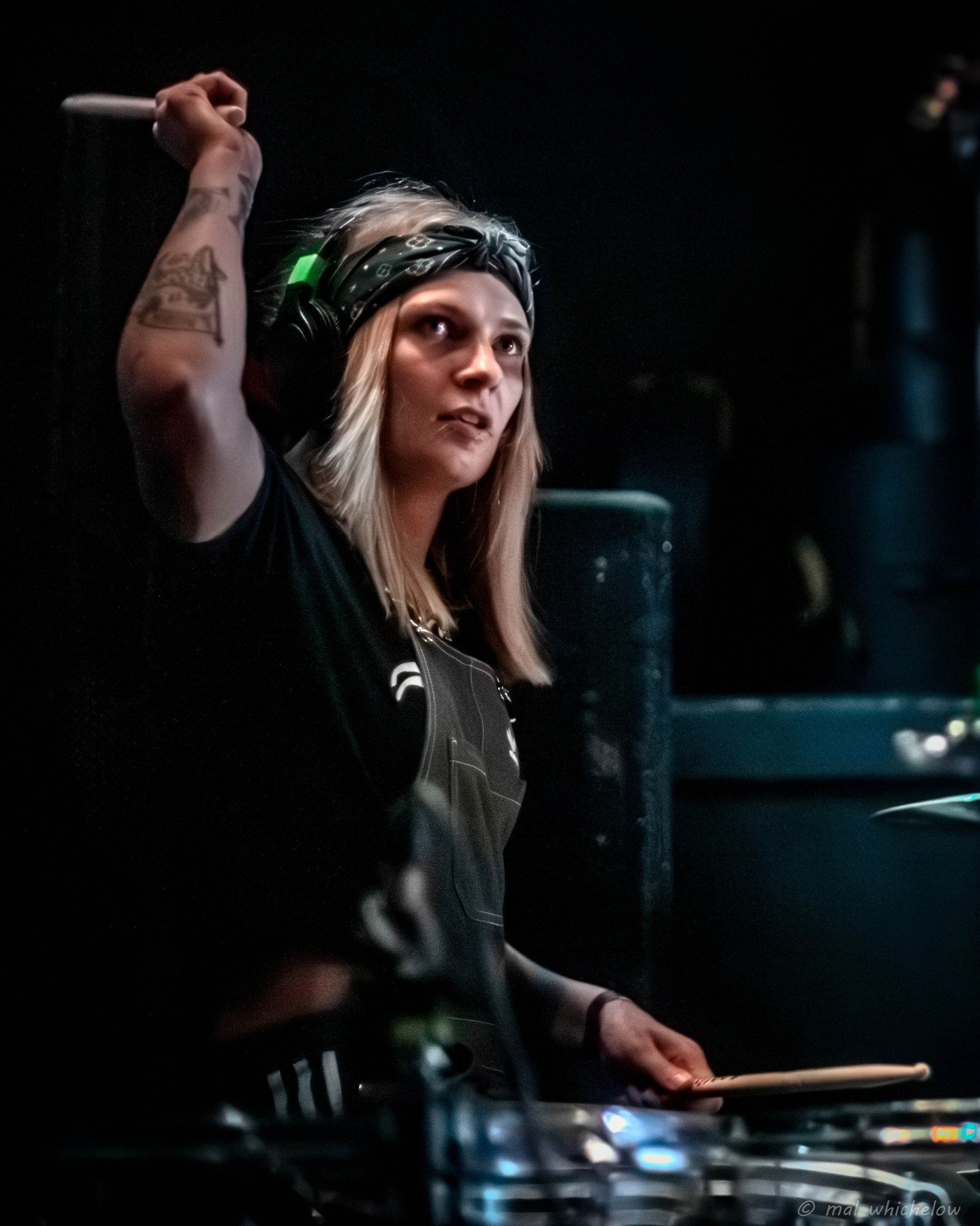 Aggy Nowicka, drummer with the Welsh hard rock band 'James Kennedy and The Underdogs' playing her drums during a concert 