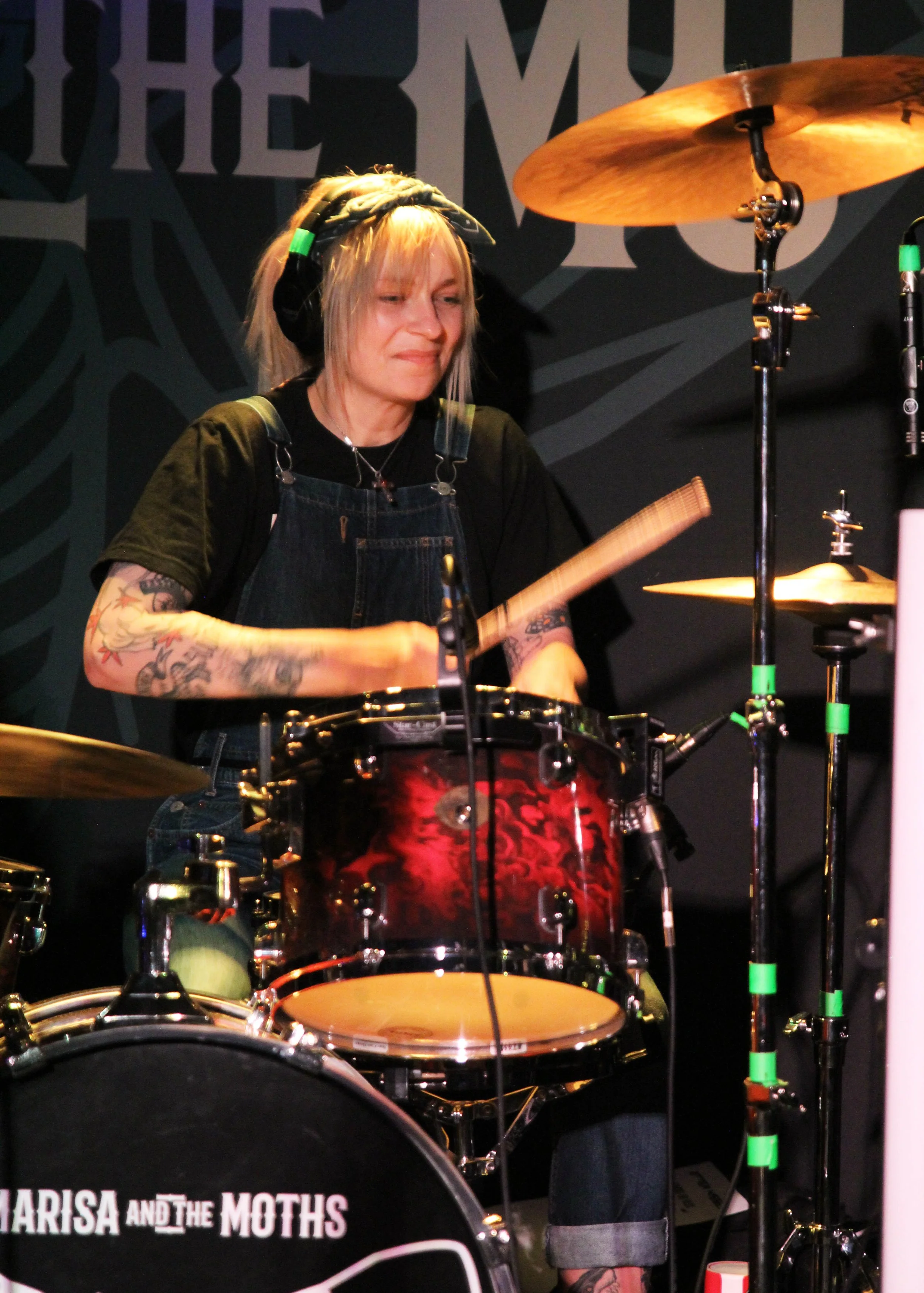 Aggy Nowicka, the drummer in the hard rock band 'James Kennedy and The Underdogs' playing drums during a live concert on tour in 2025