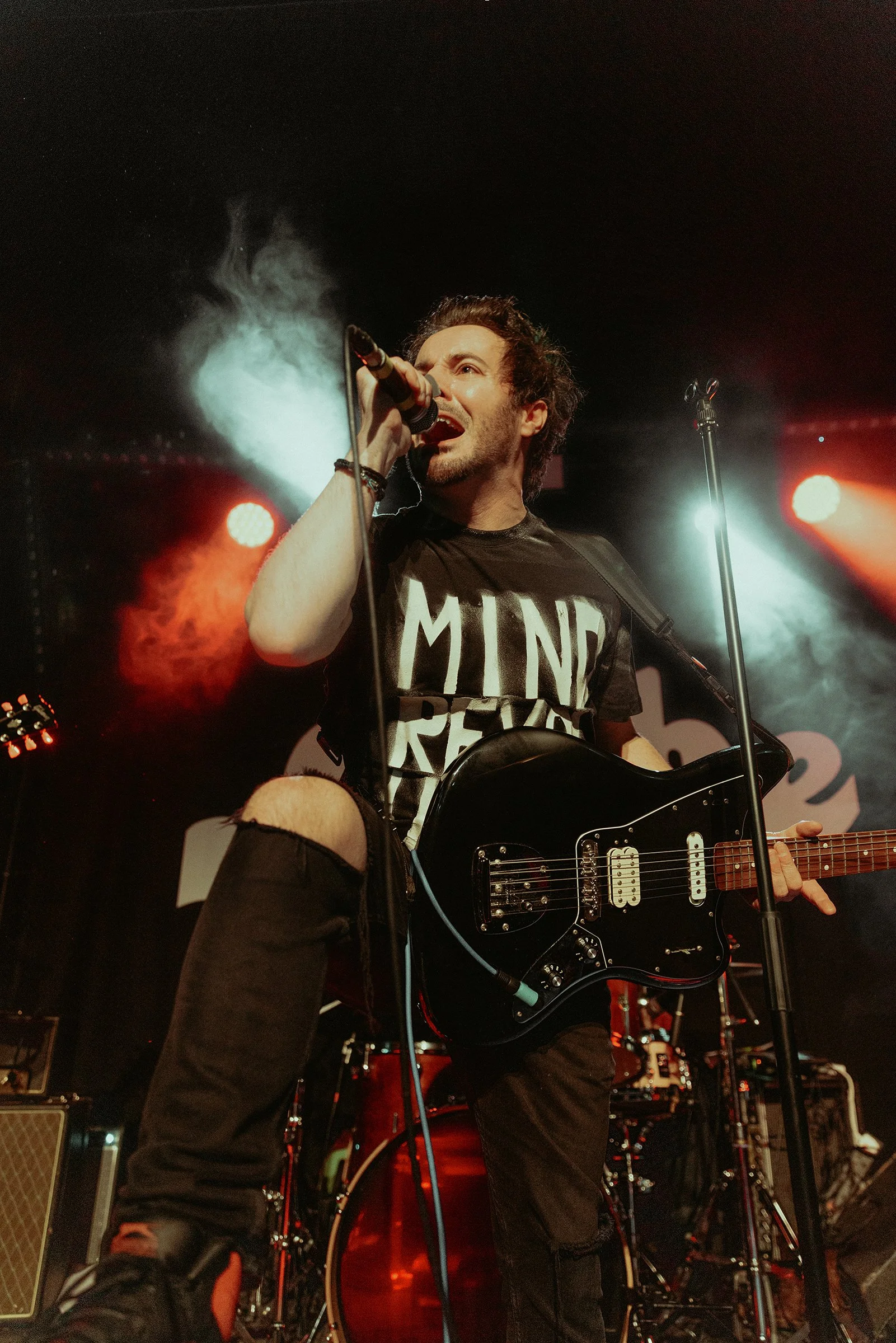 James Kennedy, the singer, podcaster and author of the books 'Noise Damage' and 'Loud Medicine' singing on stage with his band 'James Kennedy and The Underdogs' in 2023
