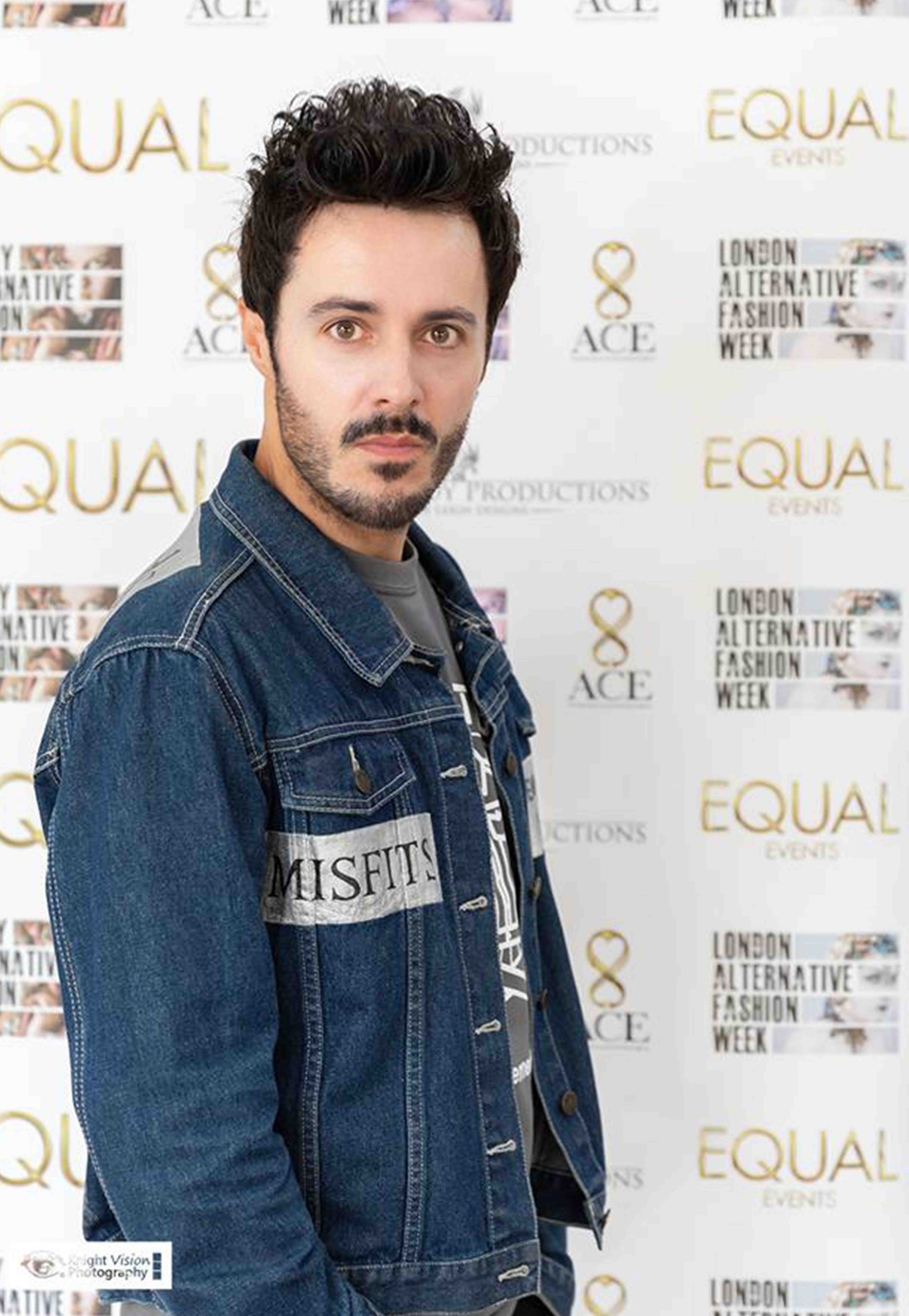 James Kennedy, singer, author and podcast host posing for the camera at an awards show in London