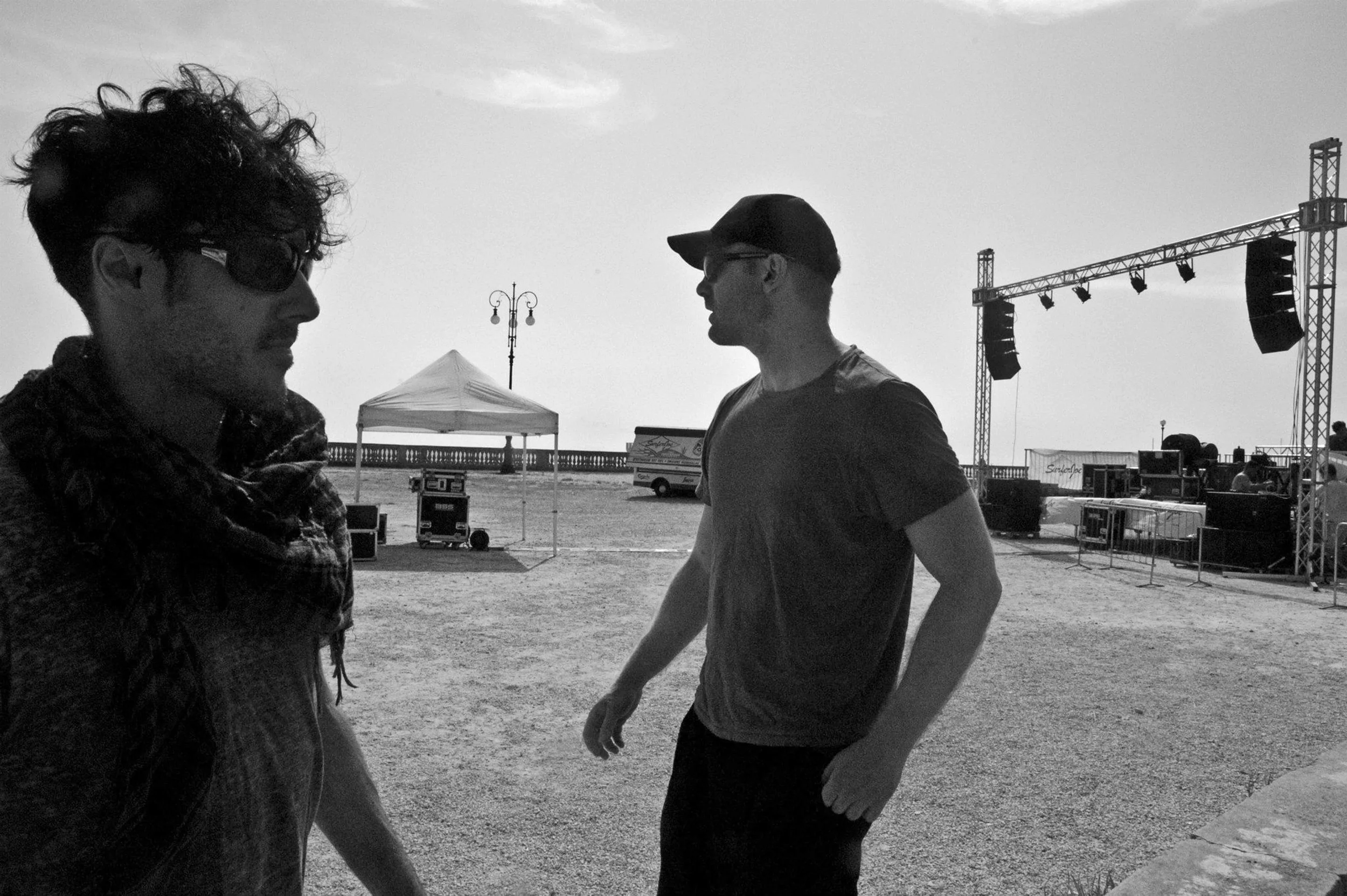 James Kennedy, the singer and Matt Warr, the bassist at an outdoor 'Kyshera' concert in Italy preparing to play a concert
