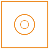 Close-up of an orange circular object resembling a speaker or a ring on a black background.