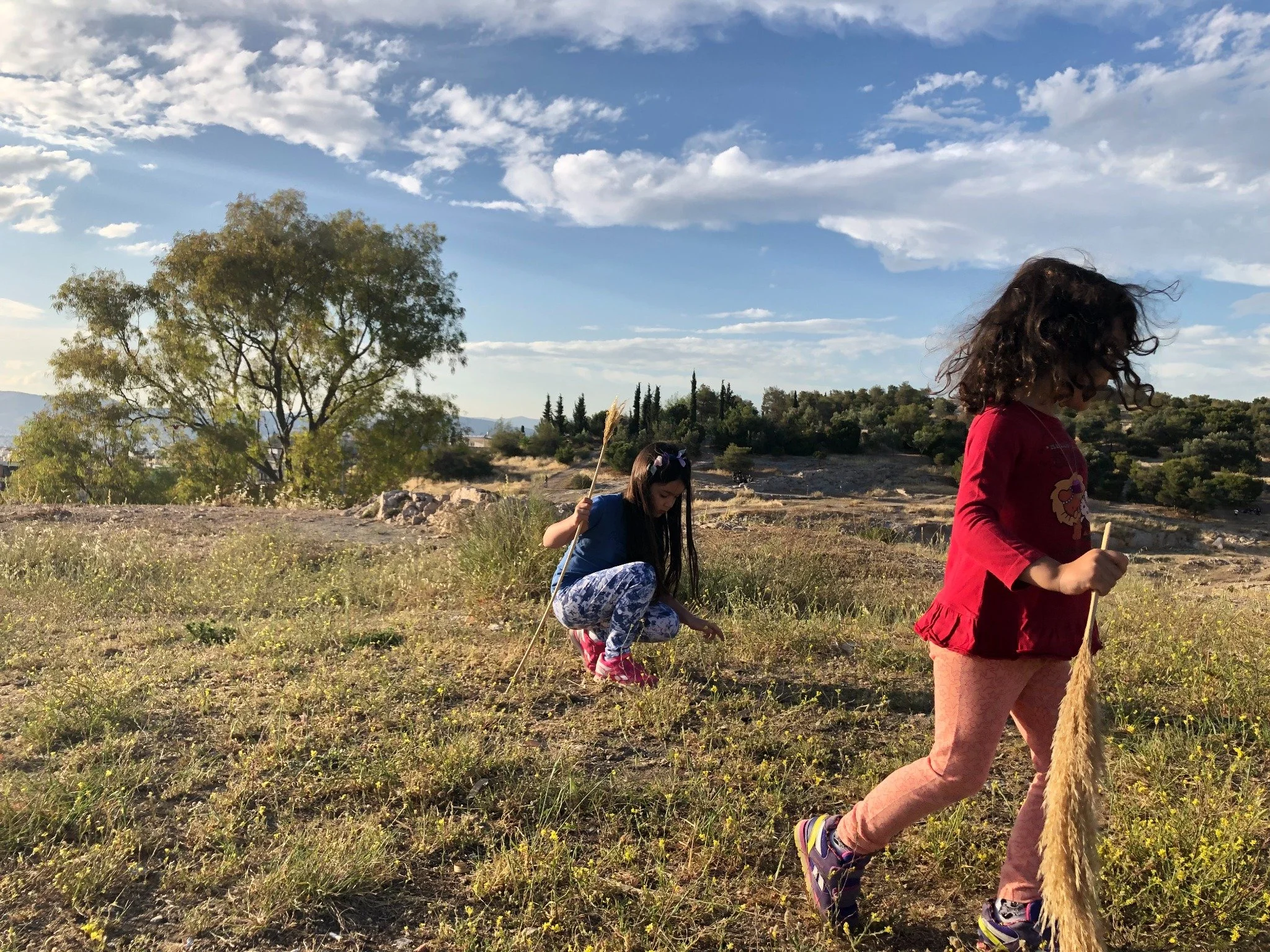 philopappos hill melpomeni house girls playing sunset athens