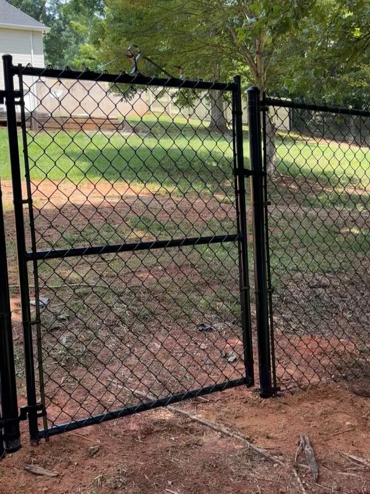 Another quality installation in the books! We wrapped up this project in Cleveland, Georgia with a chain-link and custom privacy fence combination. The job also included a 4&rsquo; walking gate and a 12&rsquo; double drive gate on the privacy fence s