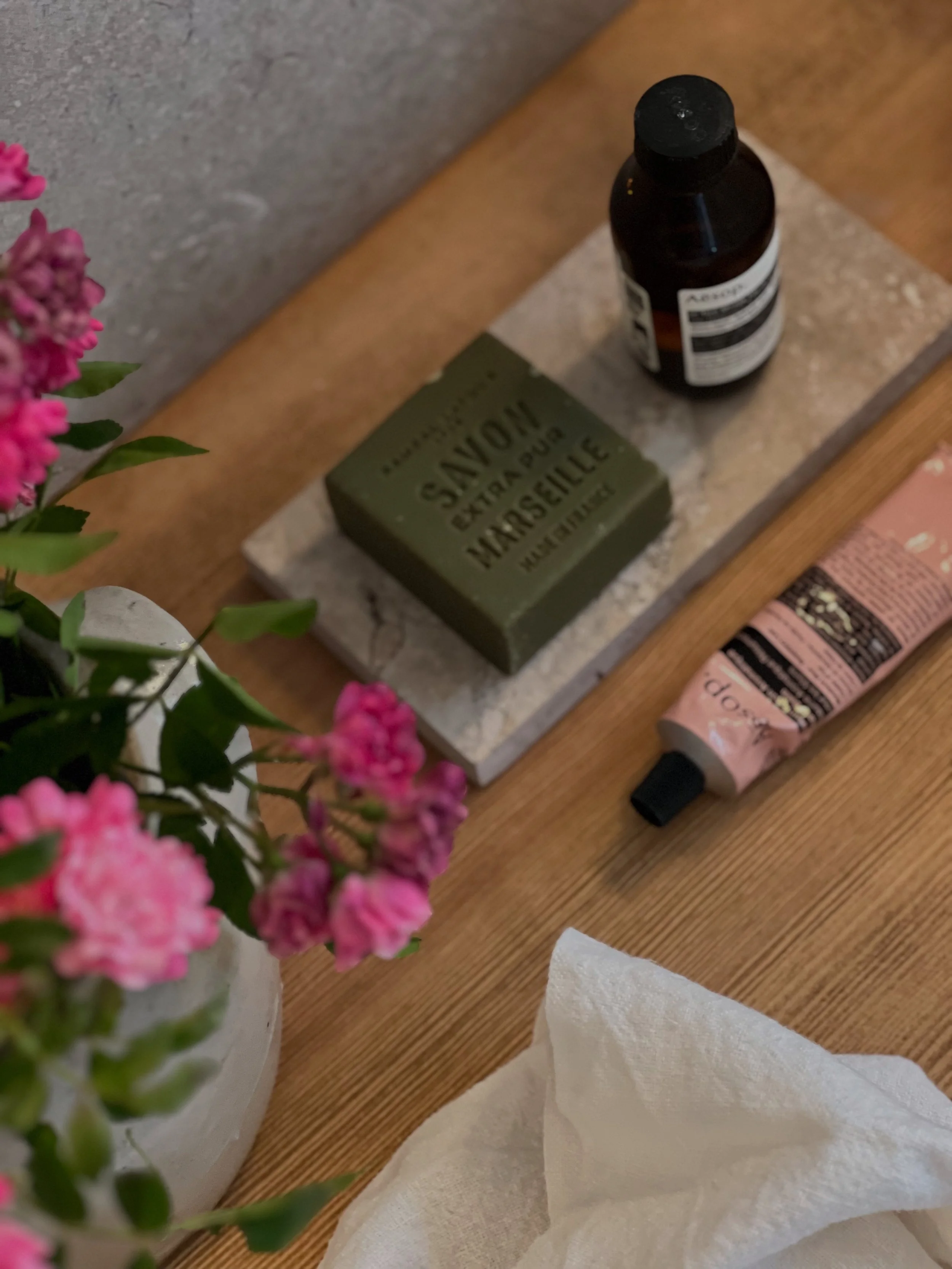 vignette, soap, flowers, cream, Aesop, savon de Marseille, stone, timber, luxury bathroom, wellness
