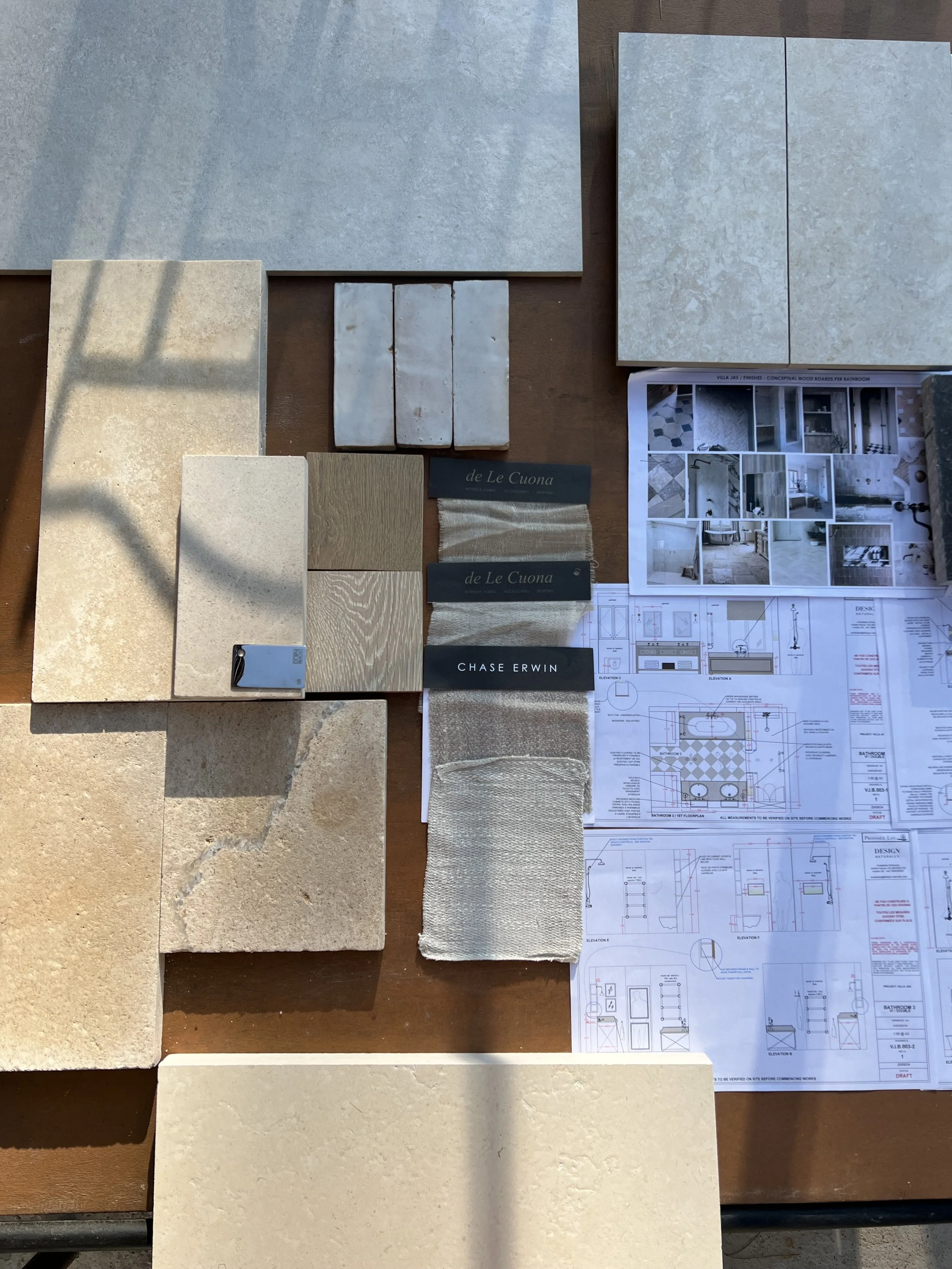 samples in natural materials and colours, stone, tile, textiles, fabrics, plans for bathroom design