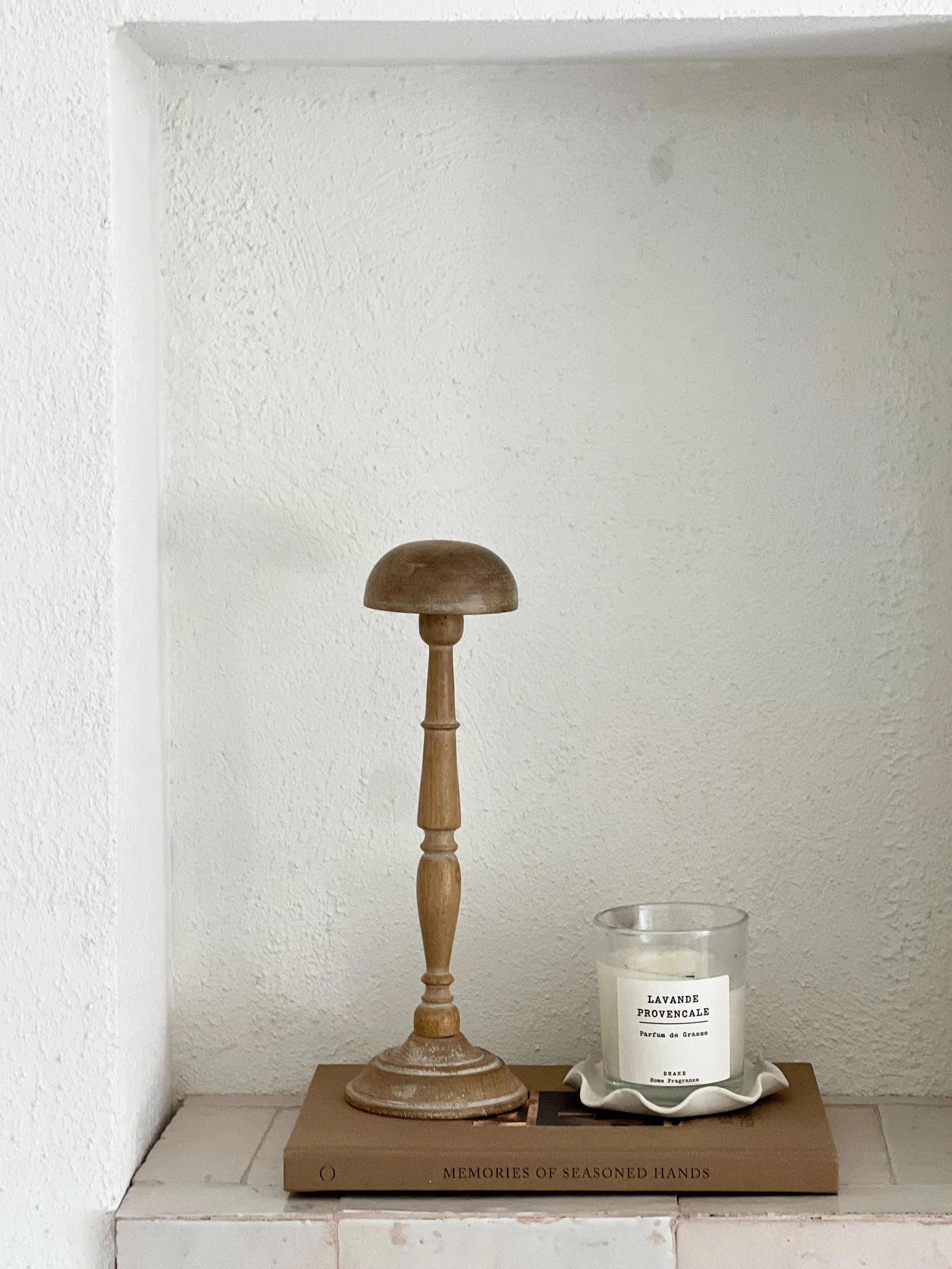 antique hat stand, candle, book, tiles, vignette detail