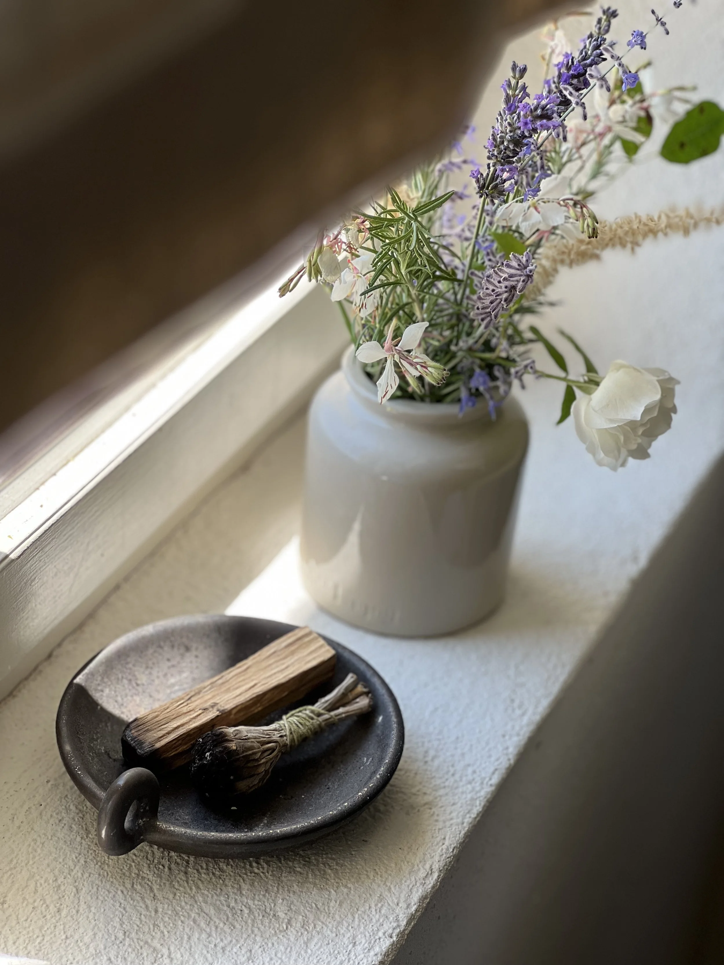 vignette showing a sheer linen blind, flowers, greenery outside, Paolo Santo dish 