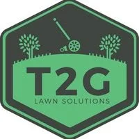Logo for T2G Lawn Solutions featuring a green badge shape with a golf club, golf ball, and trees.