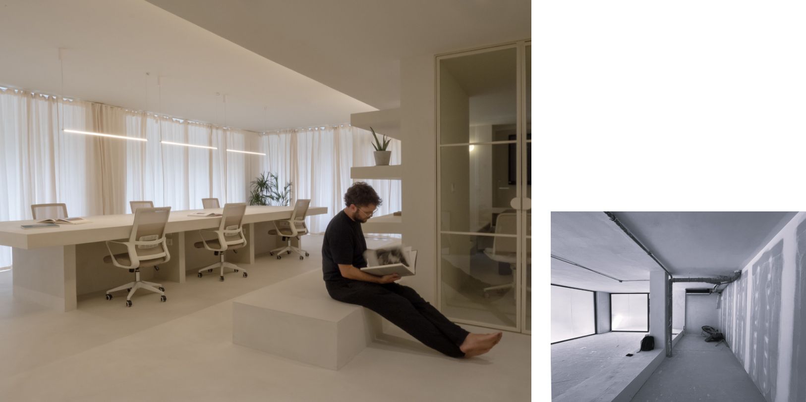 A man with curly hair and glasses, sitting on a white bench, reading a book in a modern, minimalist office space with white furniture and sheer curtains. The room has a long table with chairs, potted plants, and room dividers.