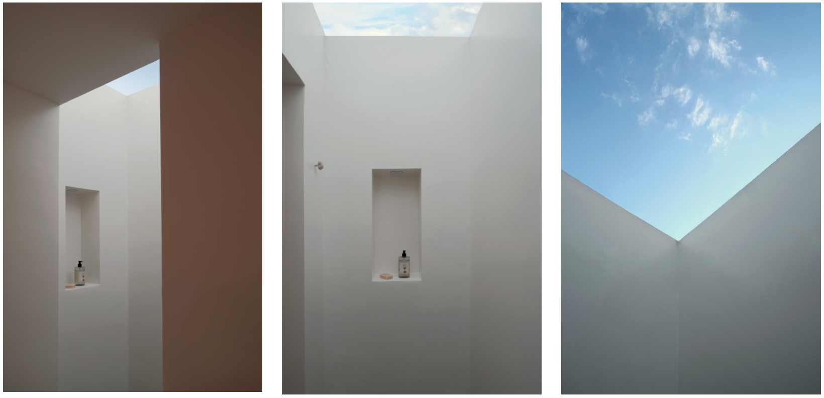 Triptych of minimalist interior views of a white courtyard with skylights, showing wall niches with soap dispensers and a view of the sky with clouds.