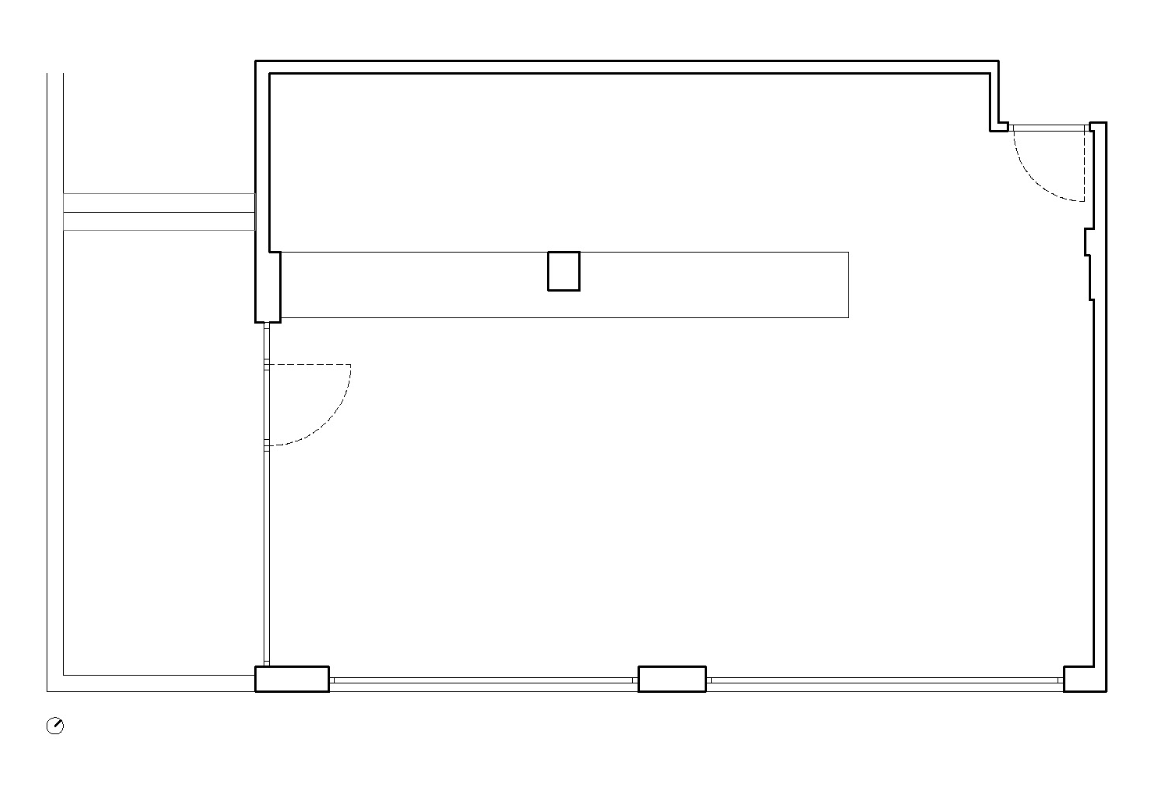 Architectural floor plan of a rectangular building with interior and exterior doors, walls, and windows.