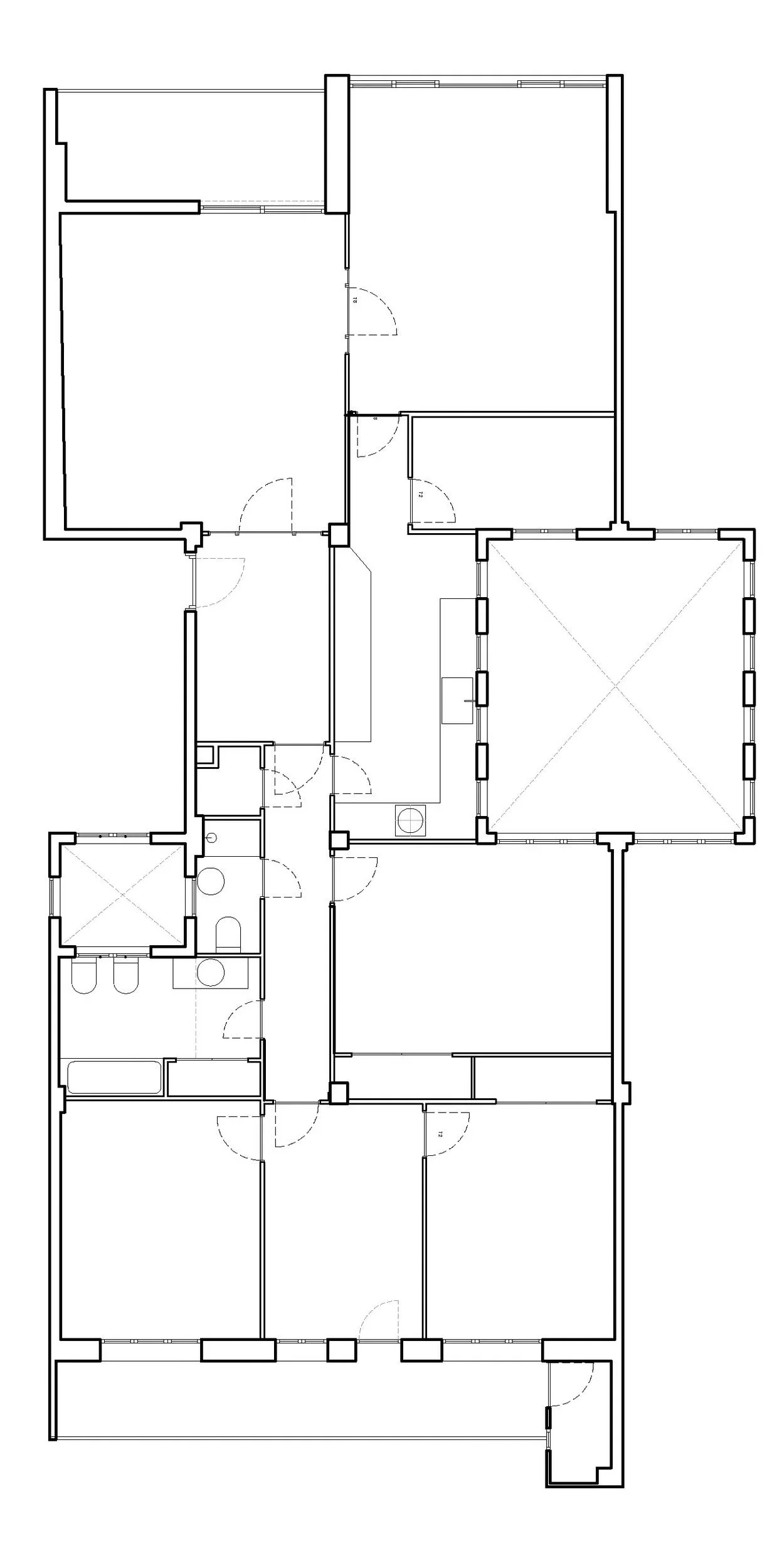 Floor plan of a house showing multiple rooms, doorways, and fixtures.