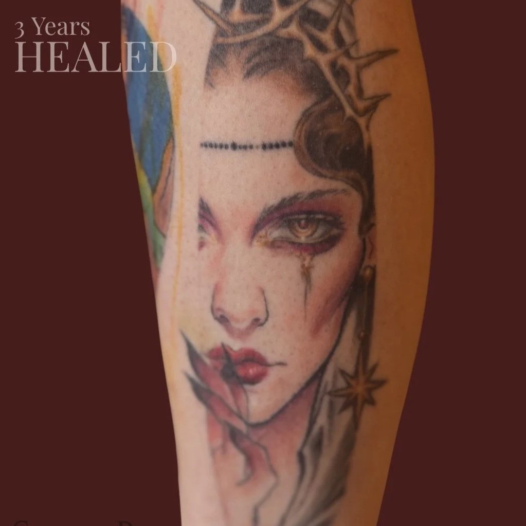 Sophie-burke-painterly-floral-dinosaur-tattoo-Wirral.jpg