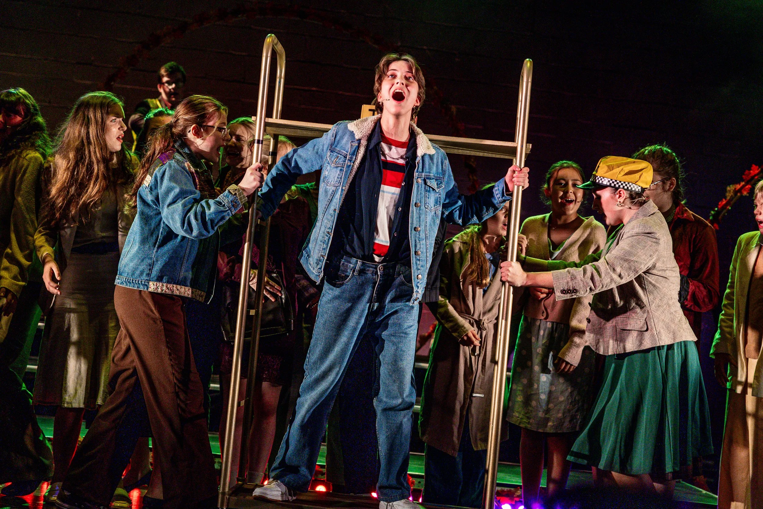 Cast of Theo in Between on stage at Leeds Carriageworks Theatre, photo by Cian O'Ráin