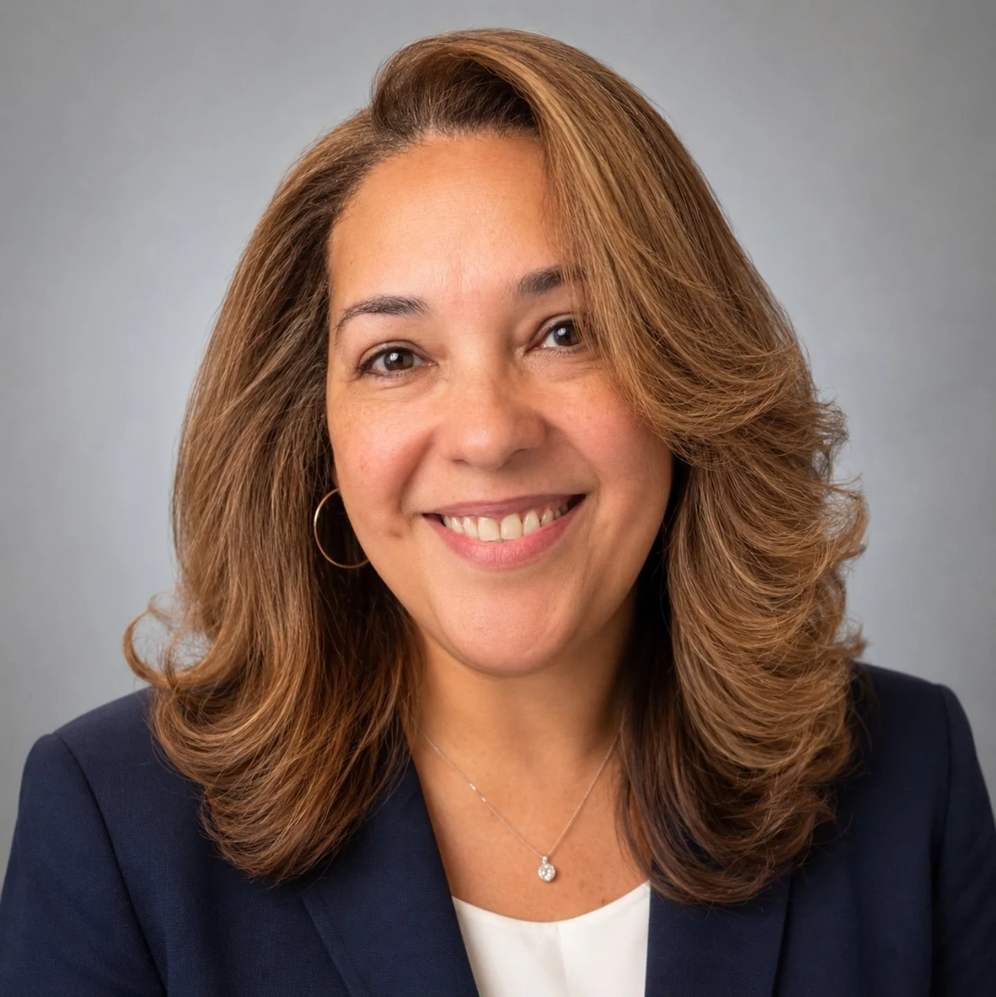 Norma Montes, Board Member of Mano Extendida PR Community Development Center, ordained minister, community chaplain, worship leader, and financial services executive.
