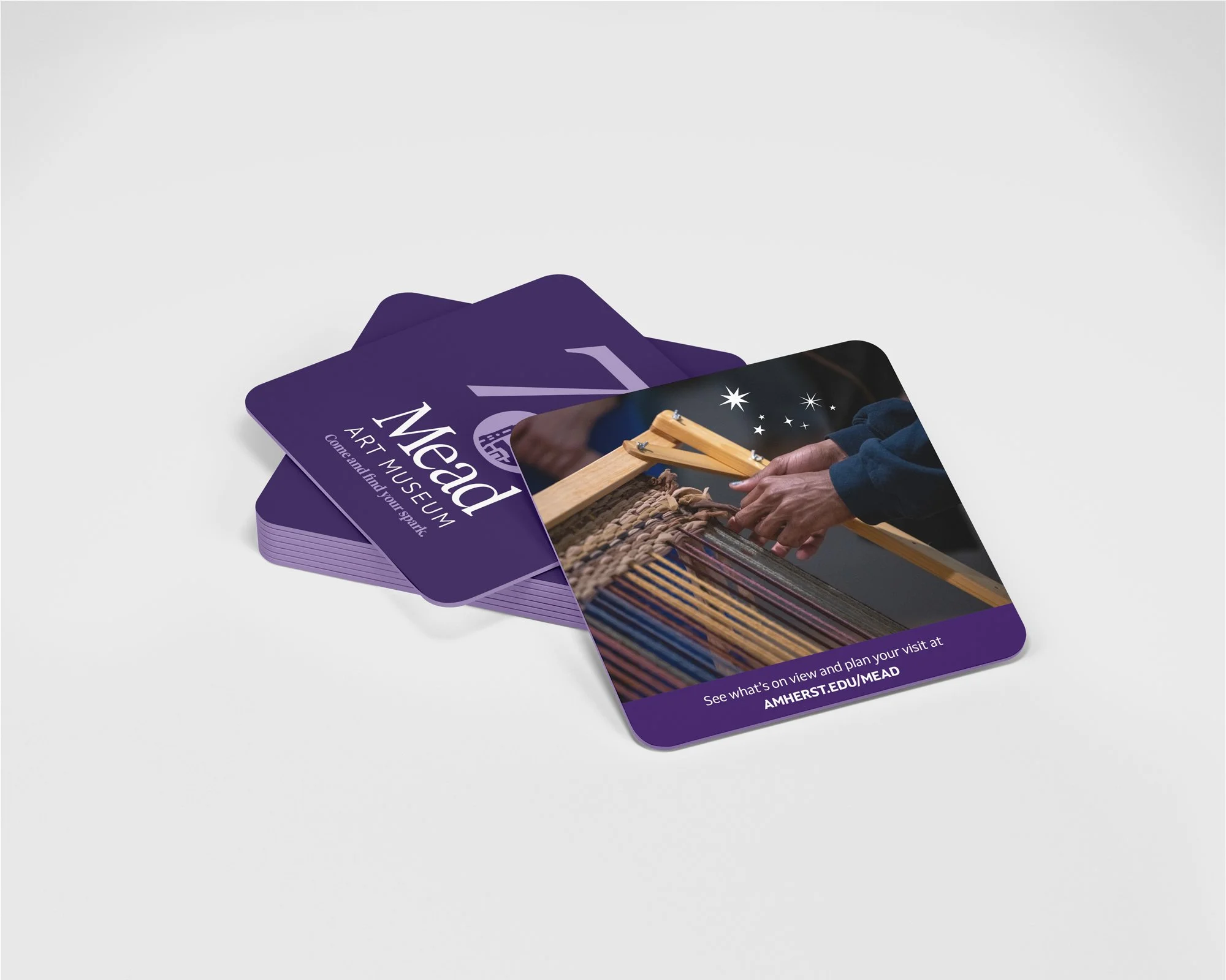 A mockup of a Mead Art Museum 75th anniversary pulp board drink coasters..