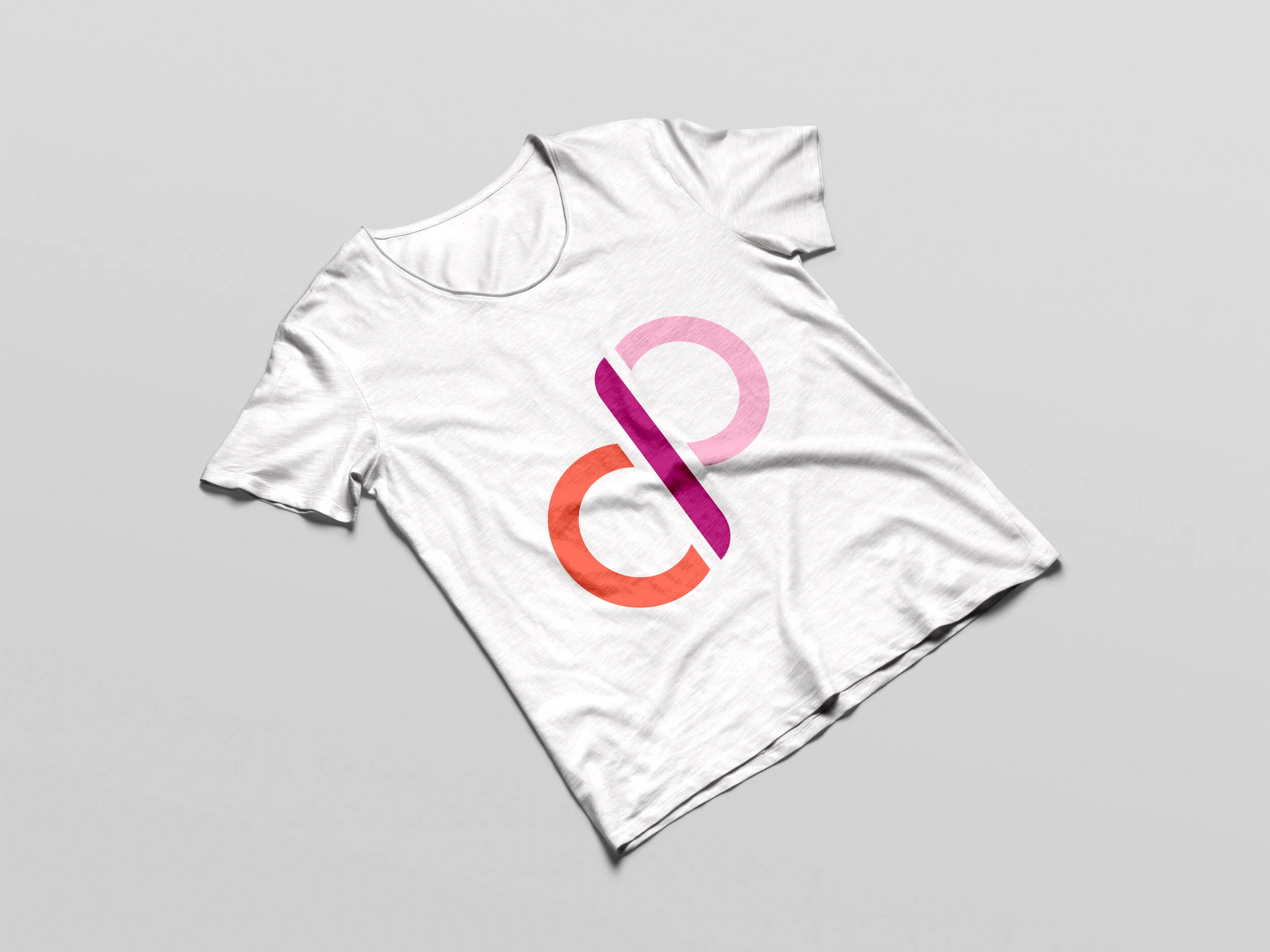 A mockup of a t-shirt with a "Classical Pilates with Caitlin" logo.