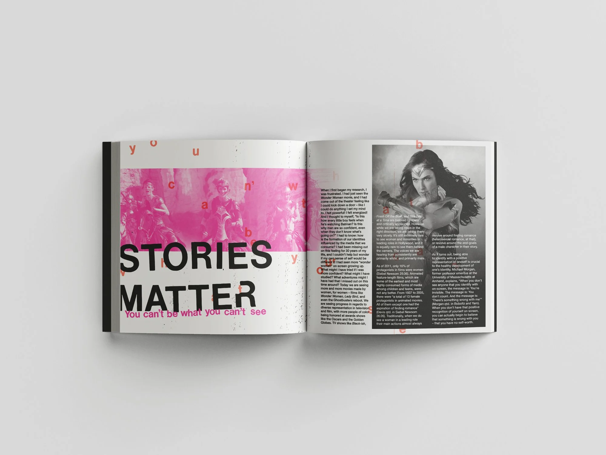 A mockup of a book spread that reads "Stories Matter: You can't be what you can't see" next to a photo of Wonder Woman.