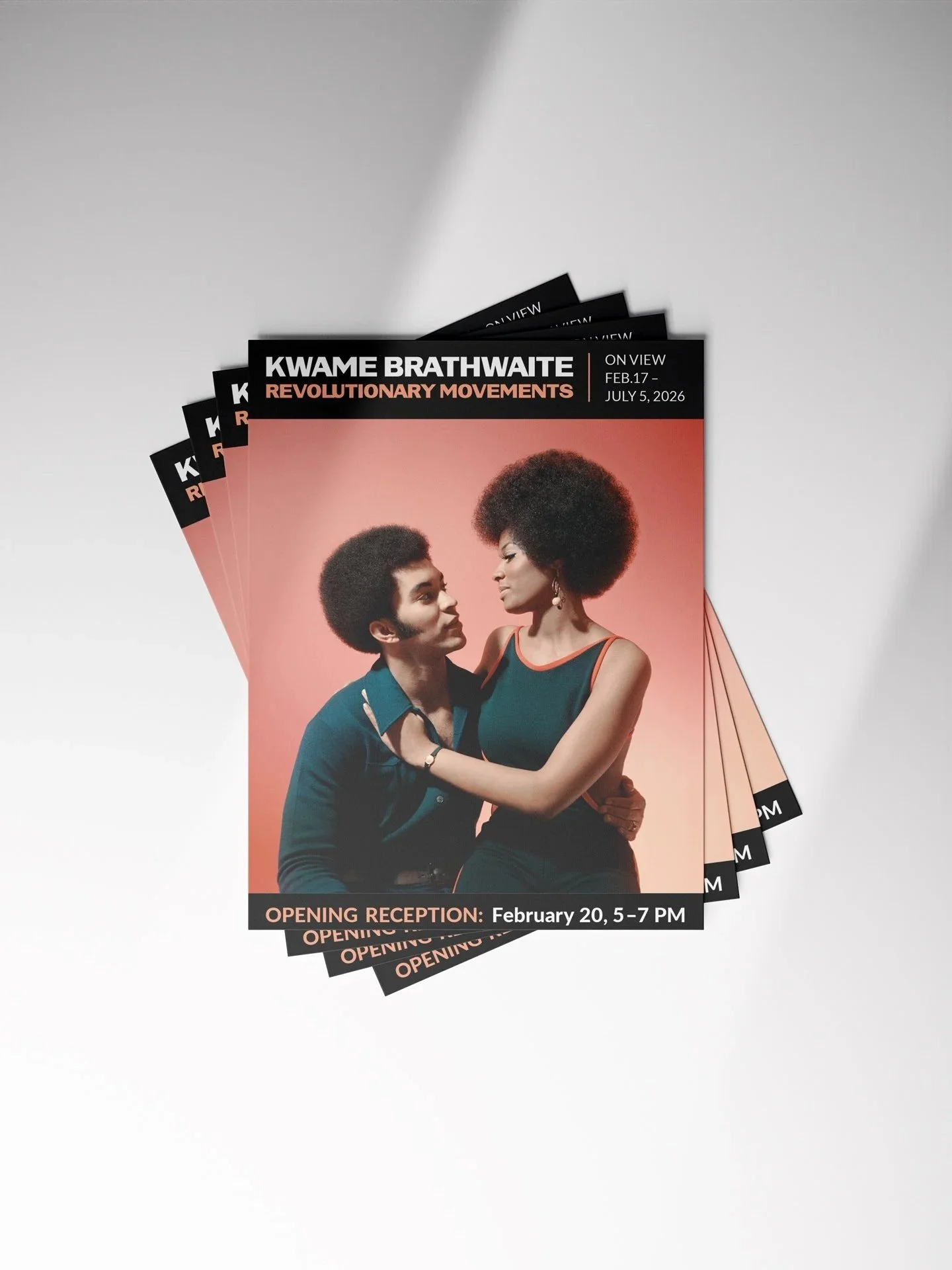 A mockup of postcard handouts promoting the Kwame Brathwaite exhibition at the Mead Art Museum, featuring a photo of two figures romantically embracing.