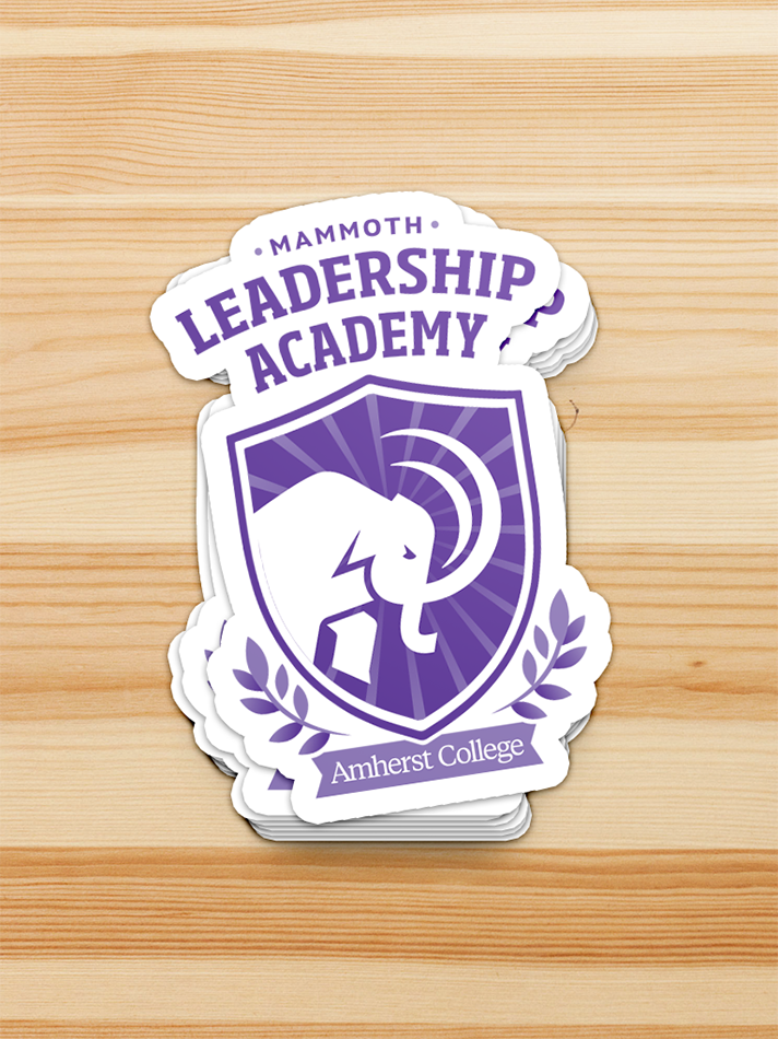 A sticker mockup of the "Mammoth Leadership Academy" logo.