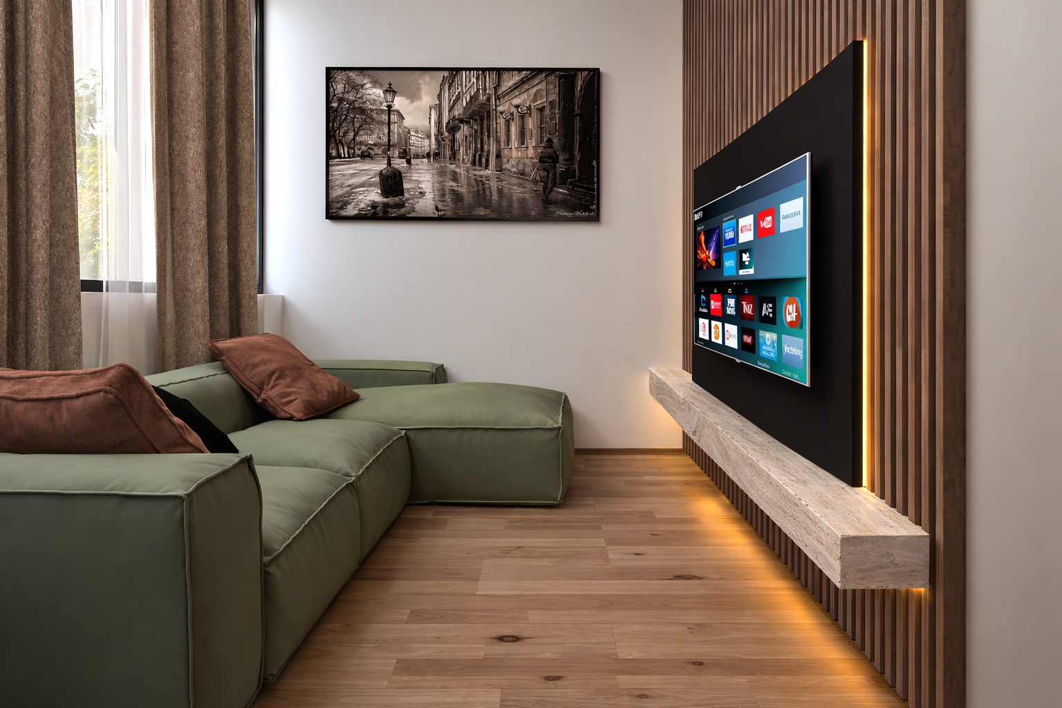 Living room with green sectional sofa, brown pillows, wall-mounted TV, framed black and white cityscape photograph, wood flooring, beige curtains, and natural light coming through window.