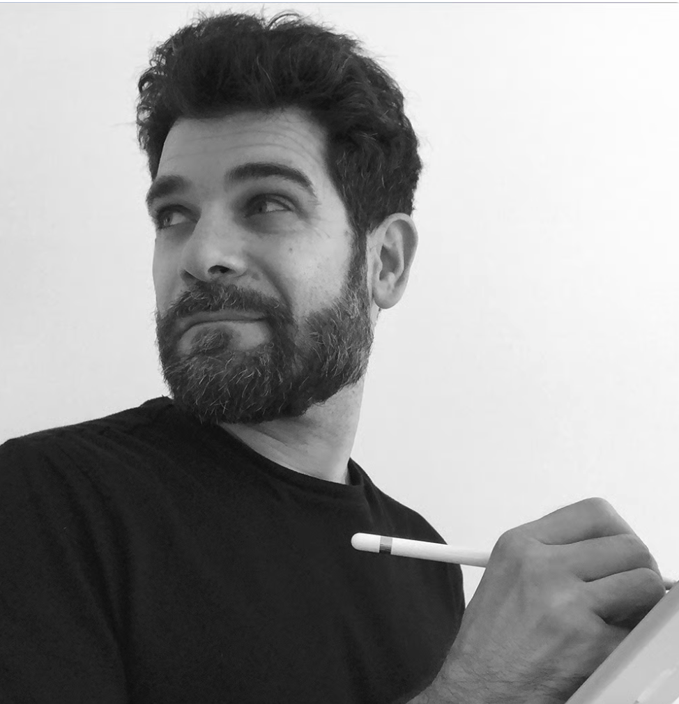 Digital artist Cesare Bellassai working with a stylus, representing the creative process of contemporary abstract art.