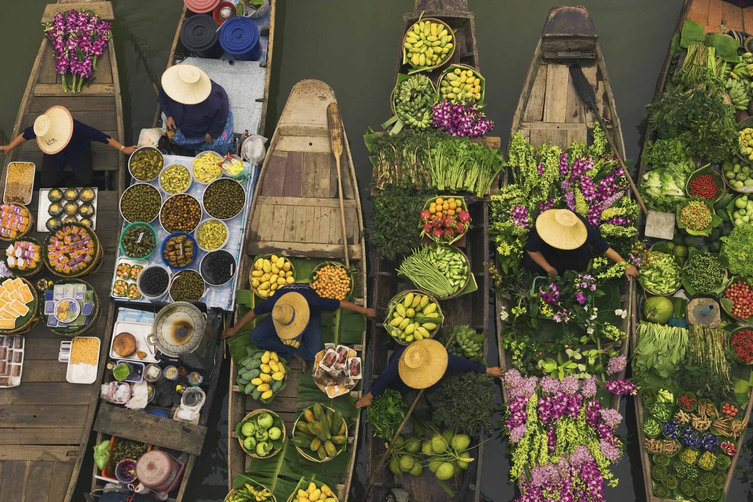 aerial-view-of-a-floating-market-on-a-canal-in-ban-2025-04-04-14-24-16-utc.jpg